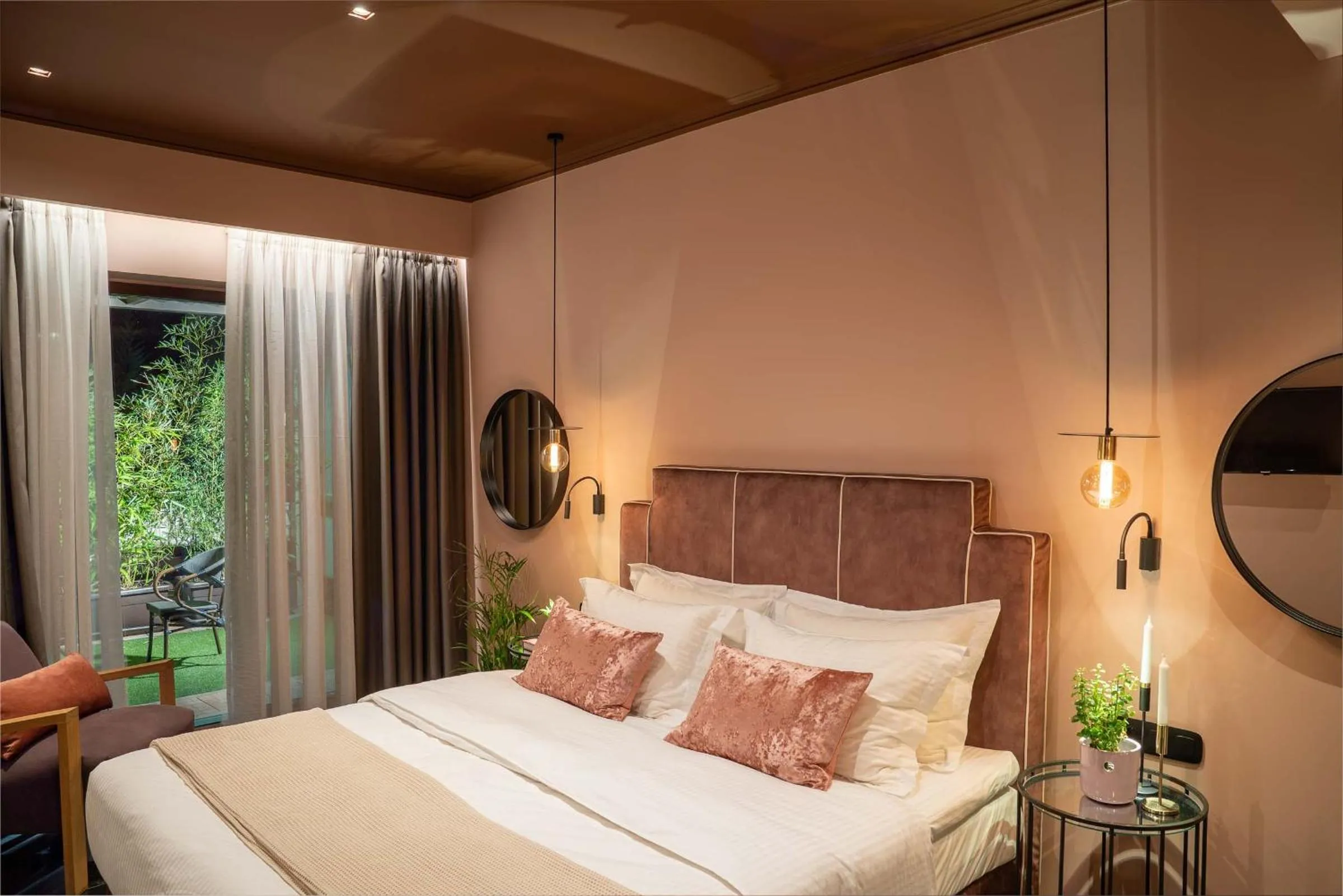 Bed in Olympus Terra Boutique Hotel