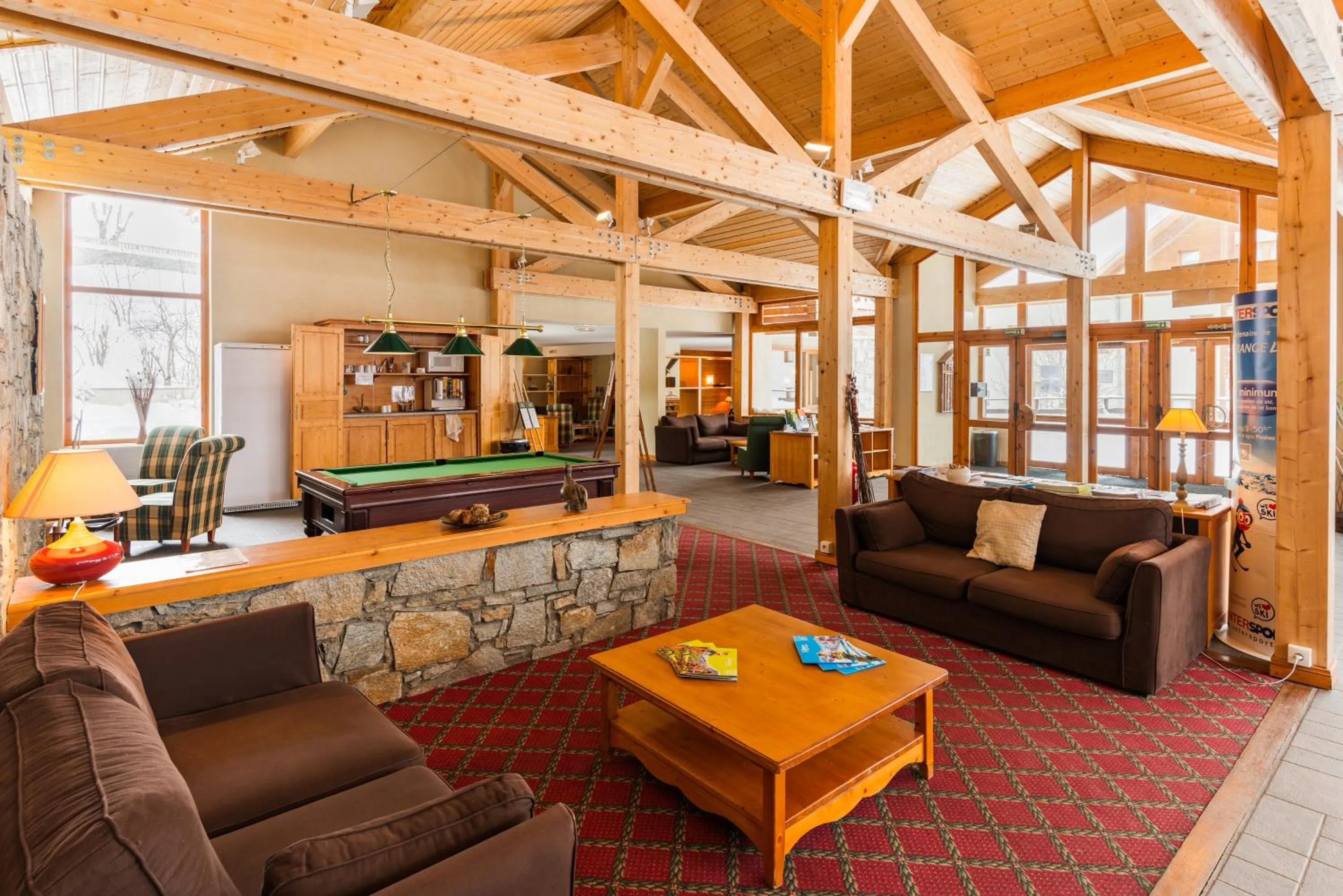 Lobby or reception in Lagrange Vacances Chalets du Galibier