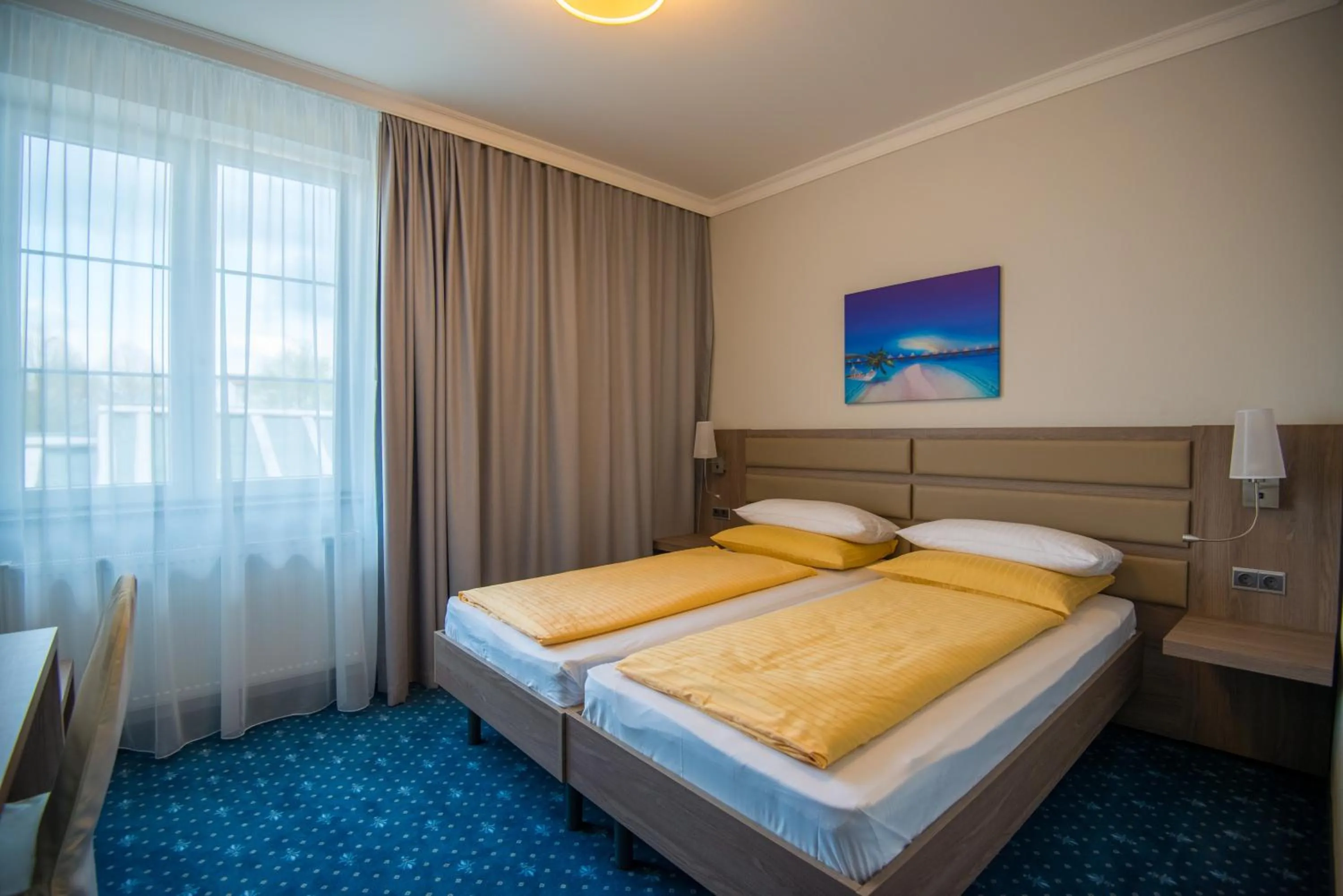 Bed in Drei Bären Hotel & Apartments