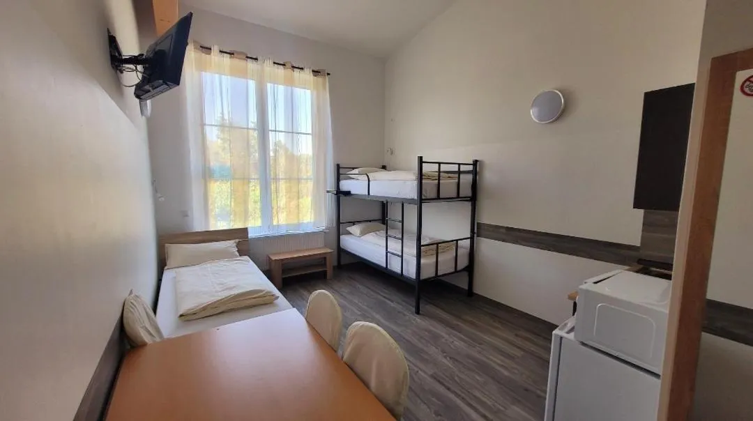 Bed in Drei Bären Hotel & Apartments