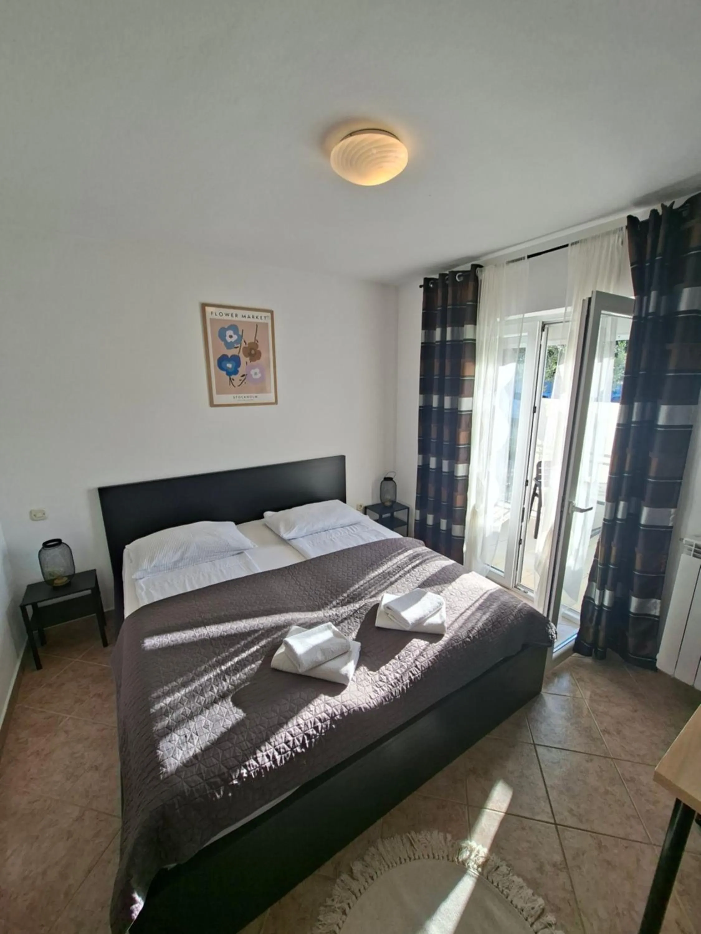 Bed in Martina Guest house-Rooms