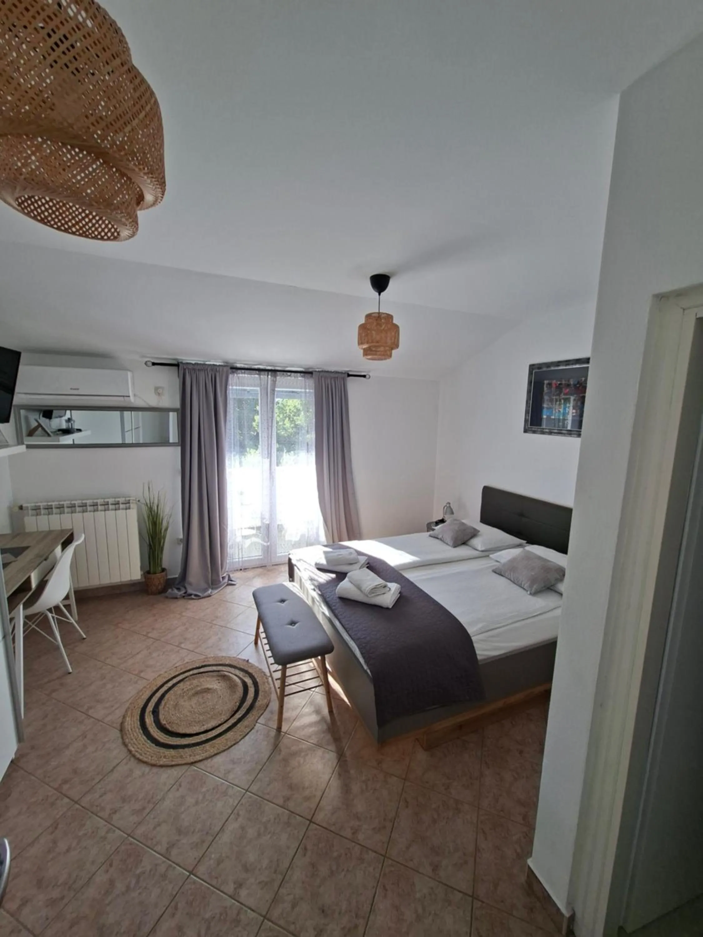 Bed in Martina Guest house-Rooms