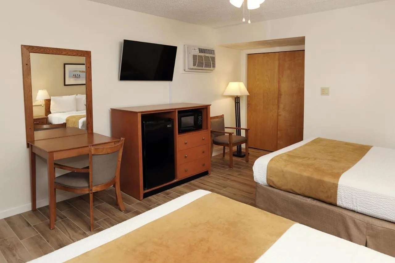 Bed in Matador Oceanfront Resort