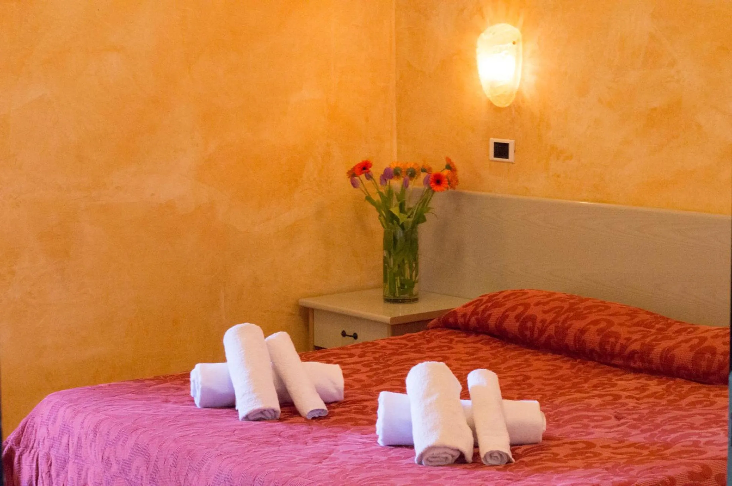 Bedroom in Amba Hotel