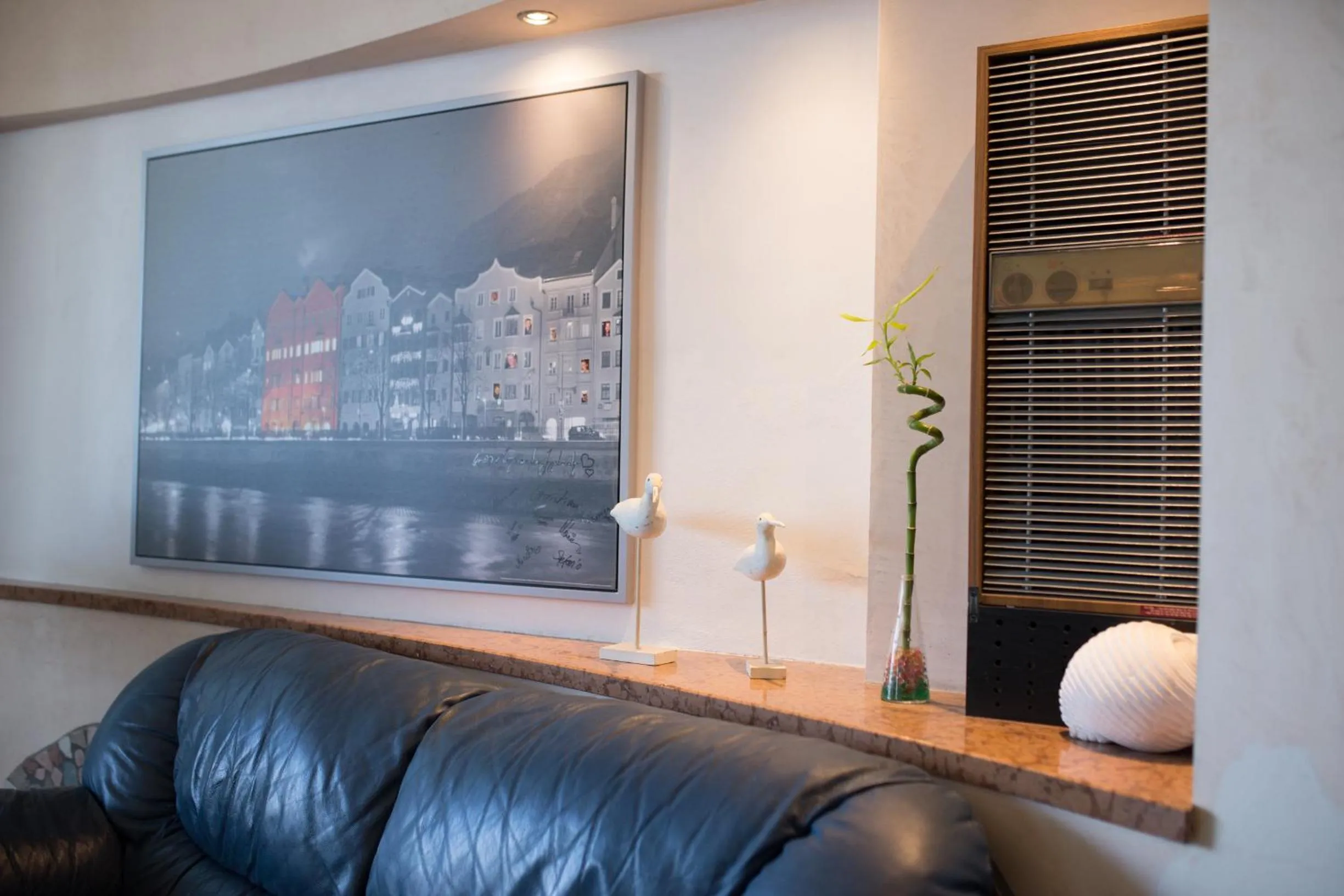 Communal lounge/ TV room in Amba Hotel