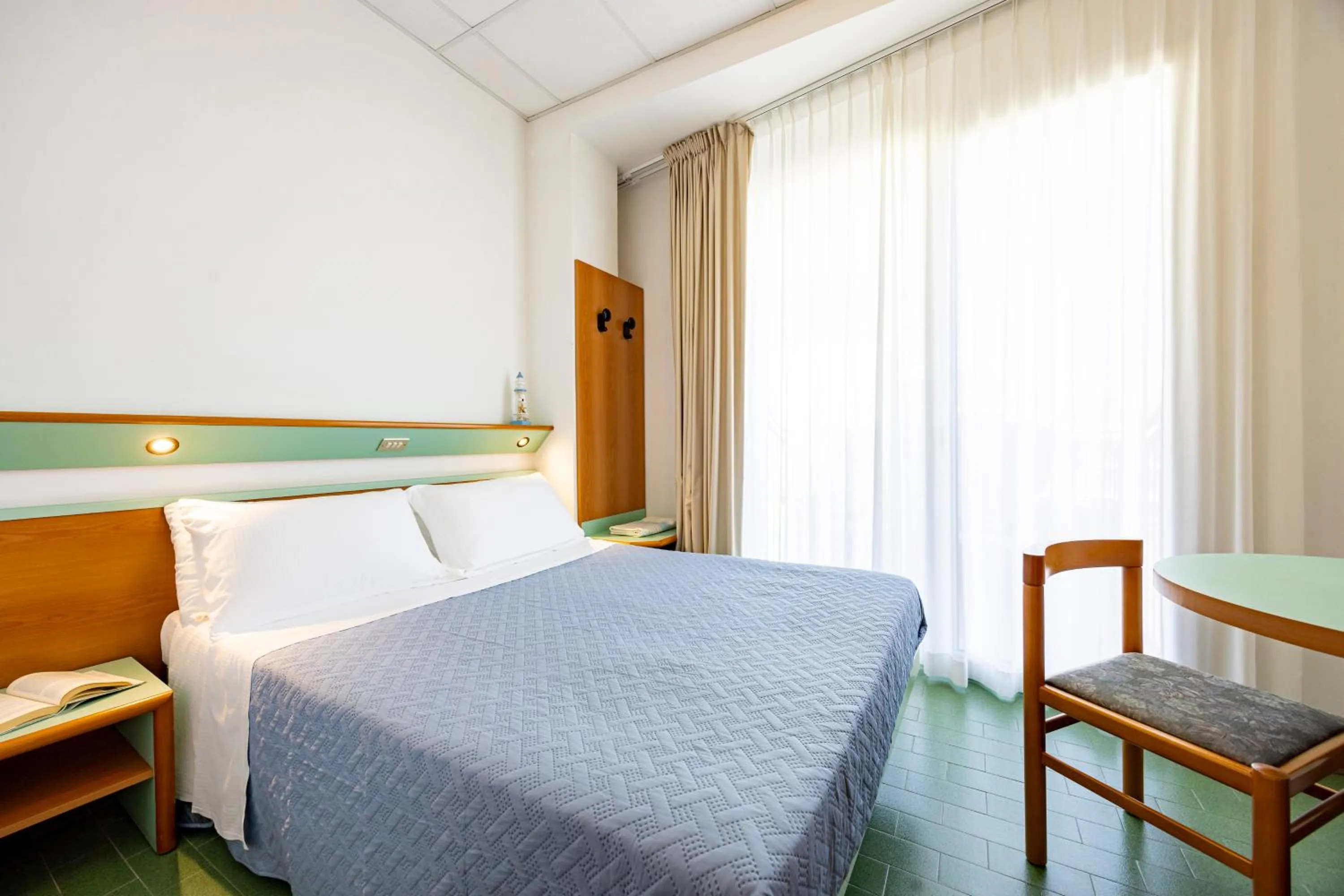 Bed in El Cid Campeador - Family Hotel