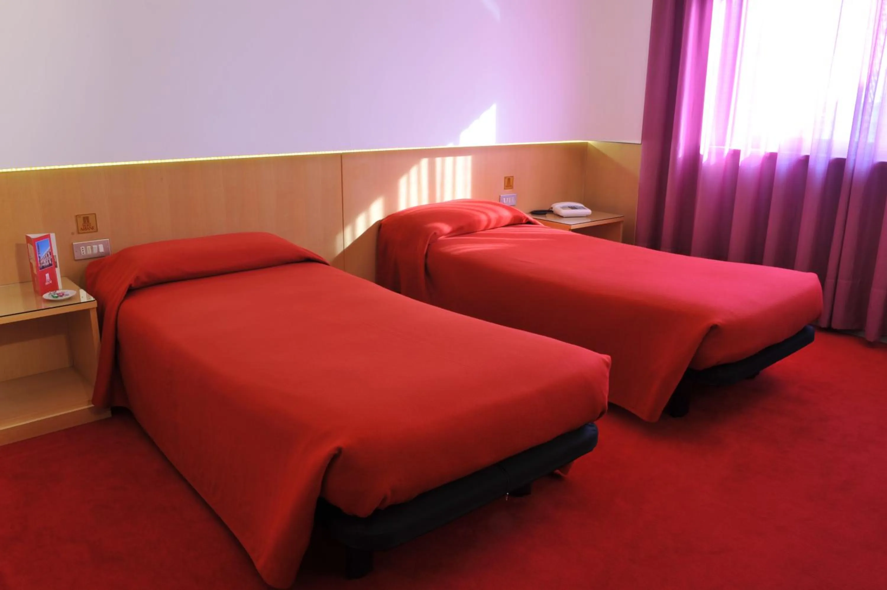 View (from property/room), Bed in Hotel Ariane