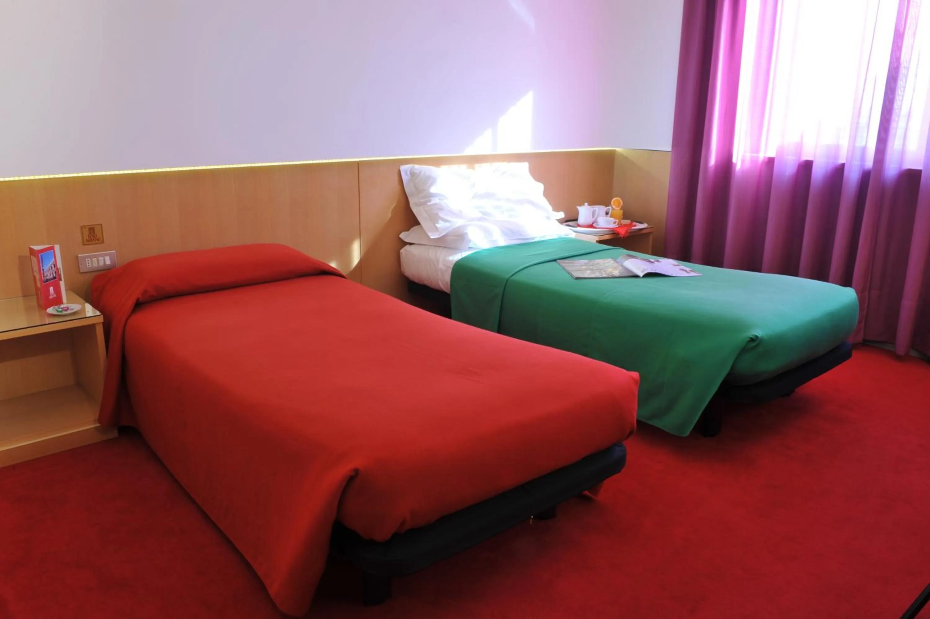 Bed in Hotel Ariane
