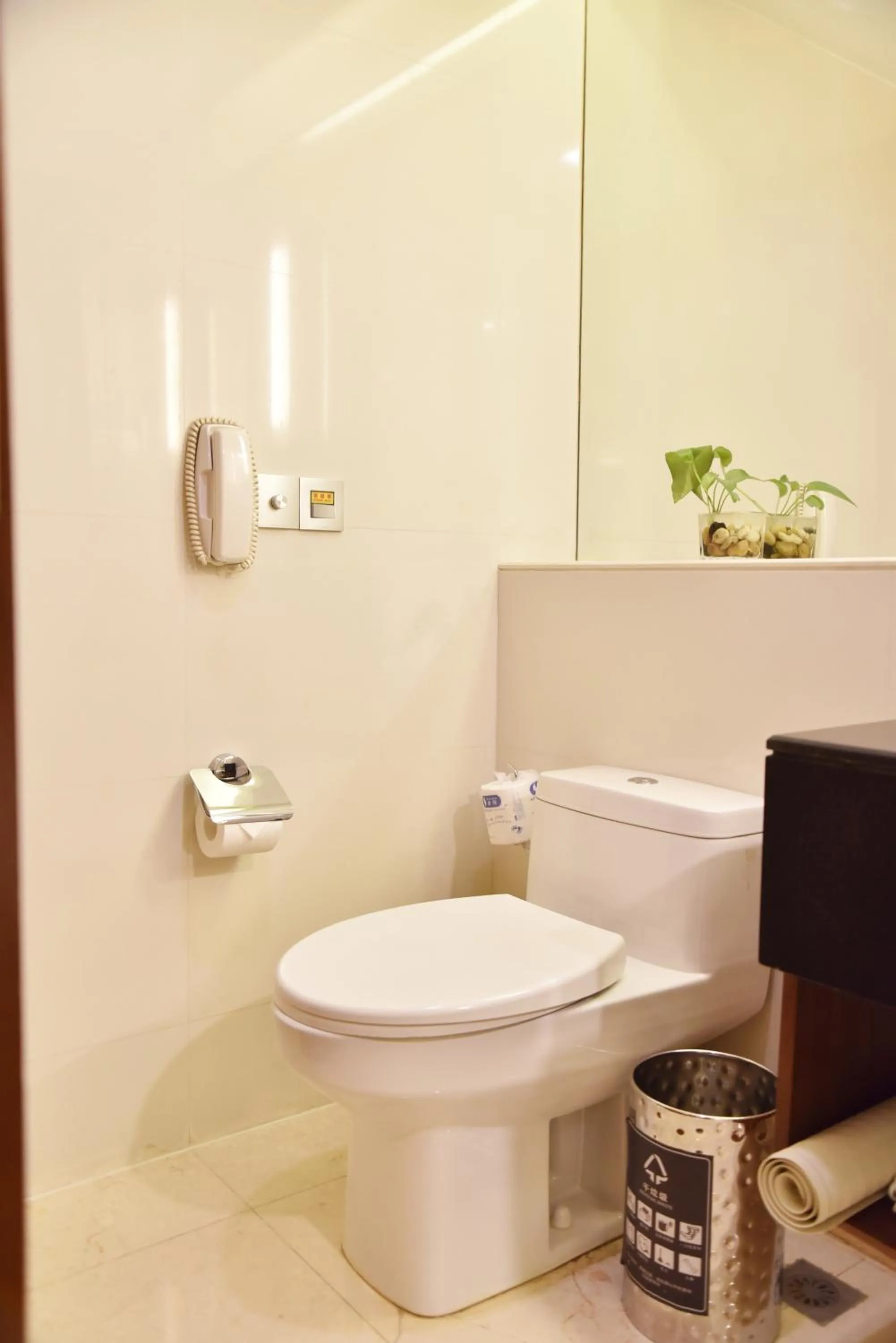 Toilet in Holiday Inn Shanghai Pudong by IHG