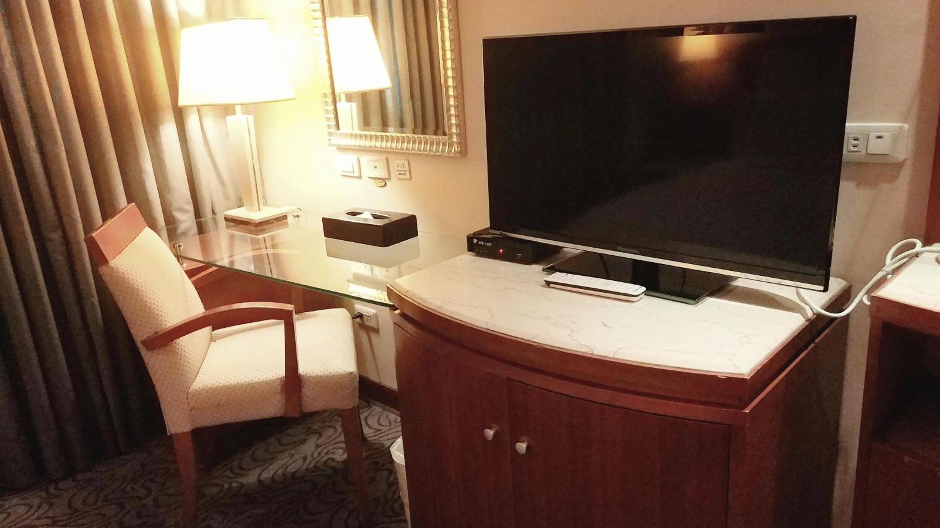 Seating area in Elegance Hotel