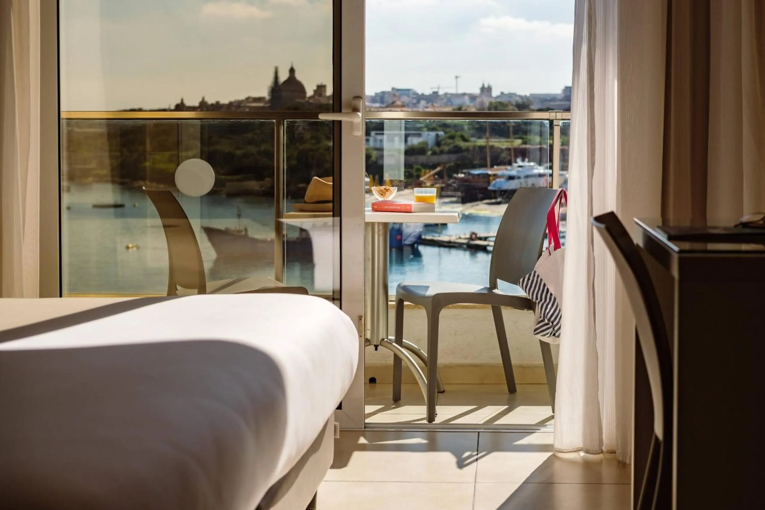 View (from property/room), Bed in 115 The Strand Hotel by NEU Collective