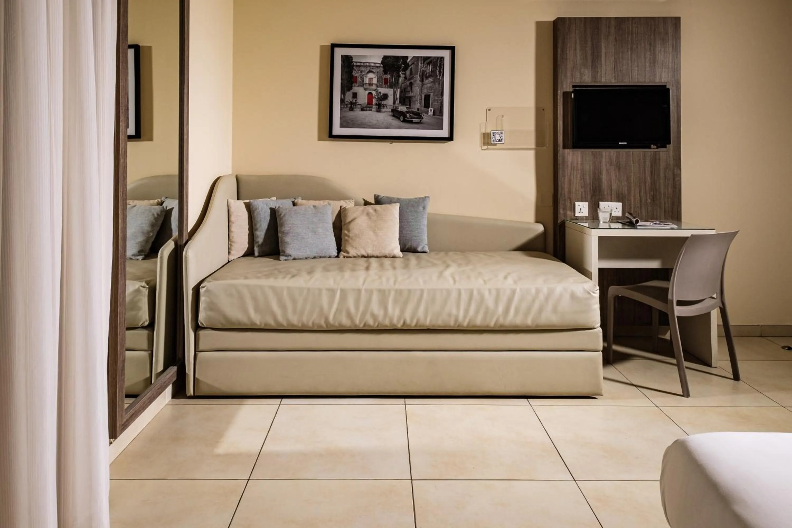 Bedroom in 115 The Strand Hotel by NEU Collective