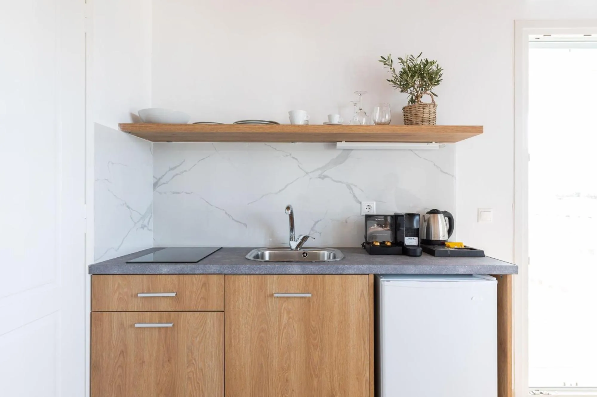 Kitchen or kitchenette in Sea Wind Villas and Suites