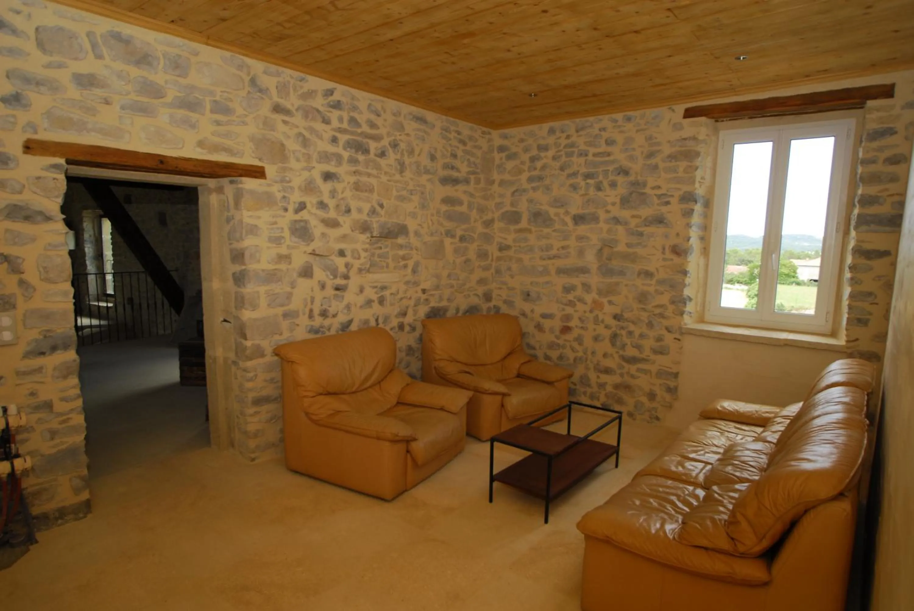 Communal lounge/ TV room in Le Coing des Vignes