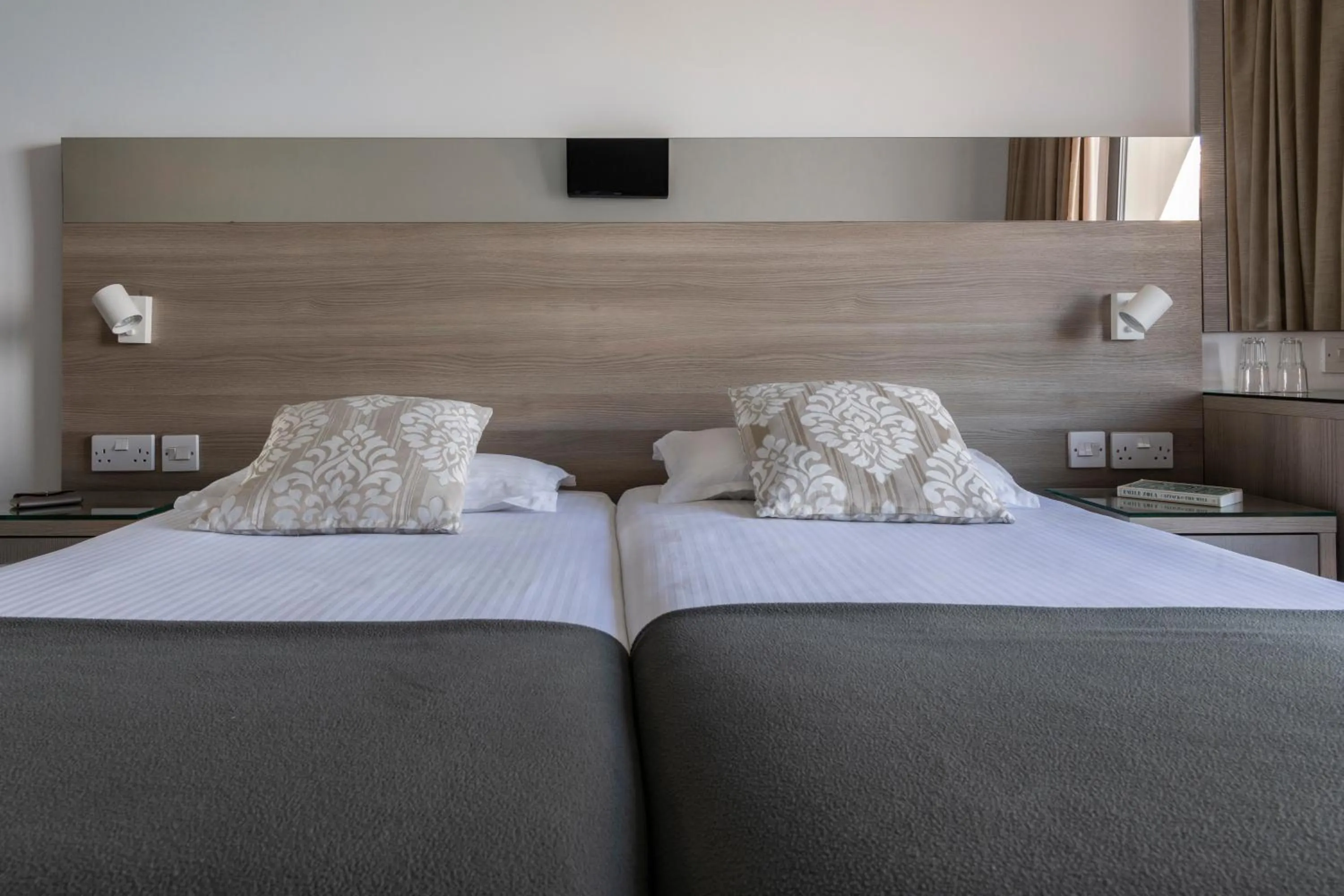 Bed in Plaza Regency Hotels