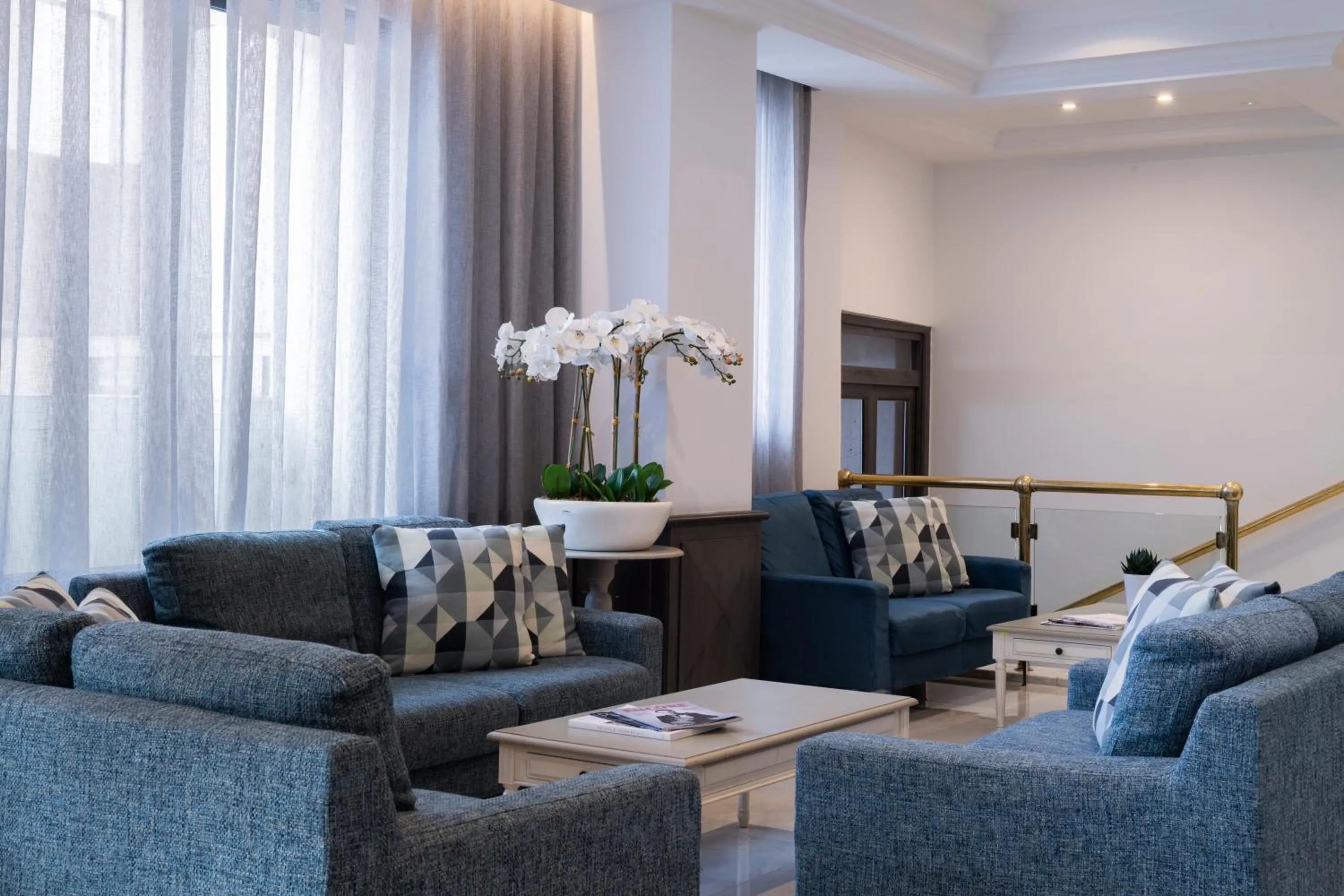 Lobby or reception in Plaza Regency Hotels