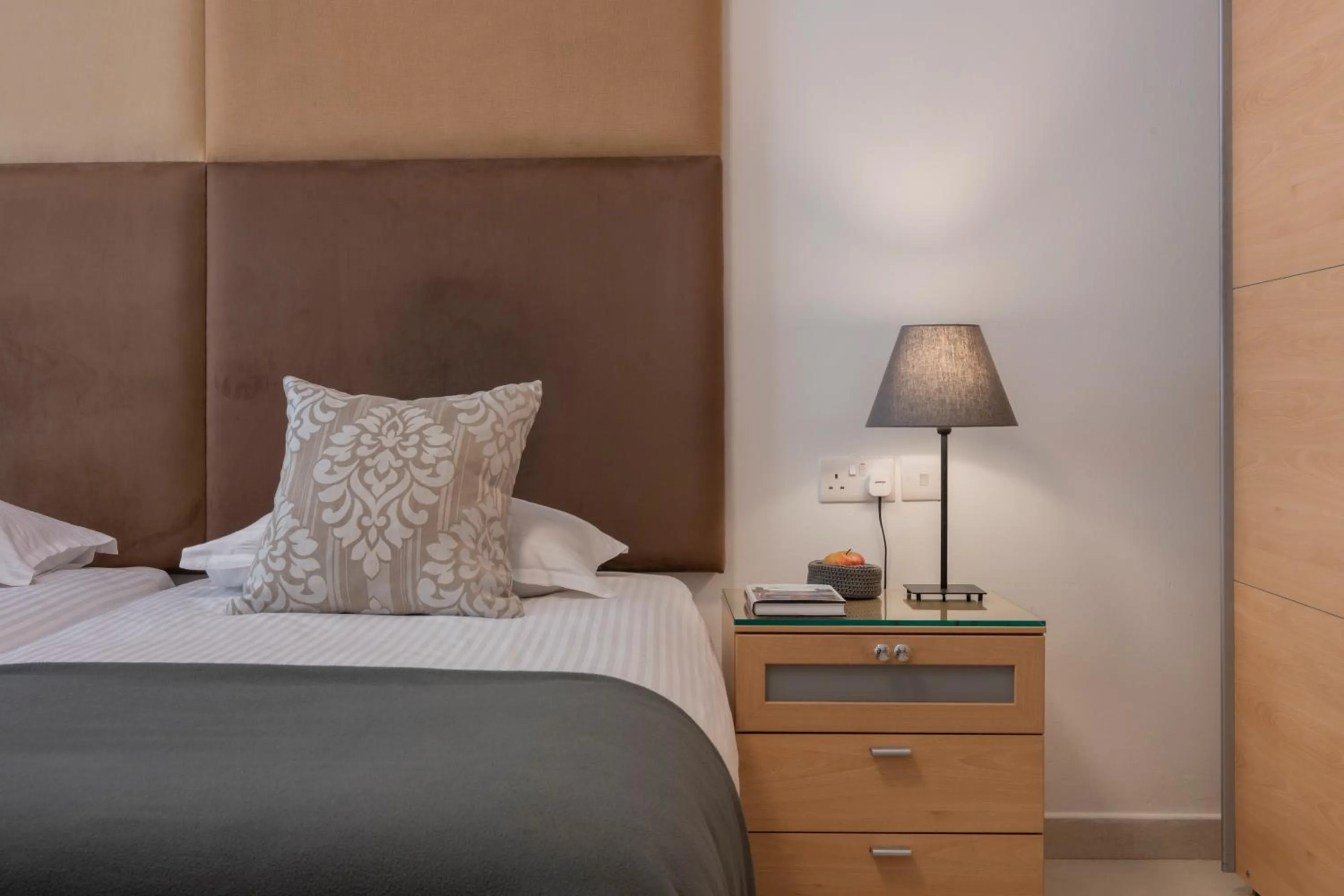 Bed in Plaza Regency Hotels