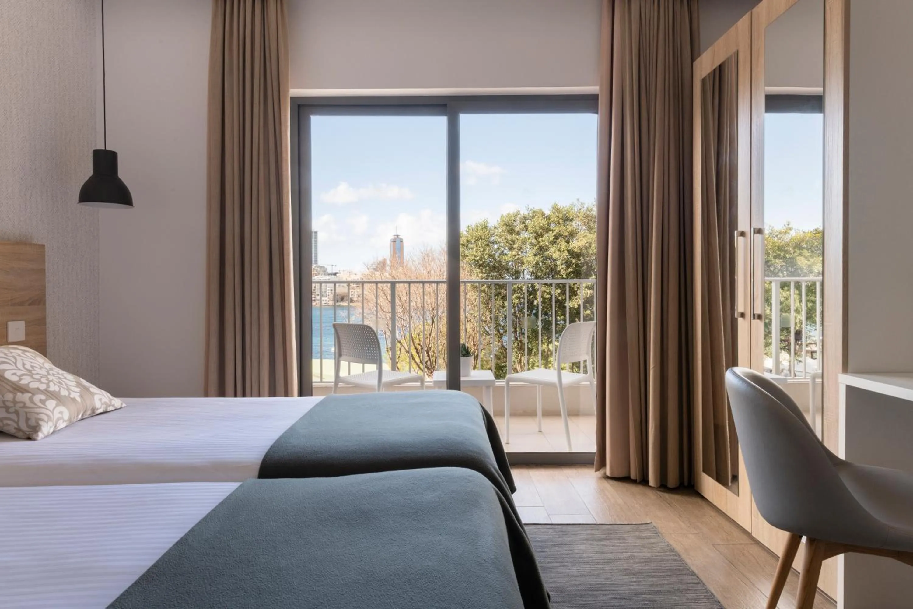 Bedroom, Bed in Plaza Regency Hotels