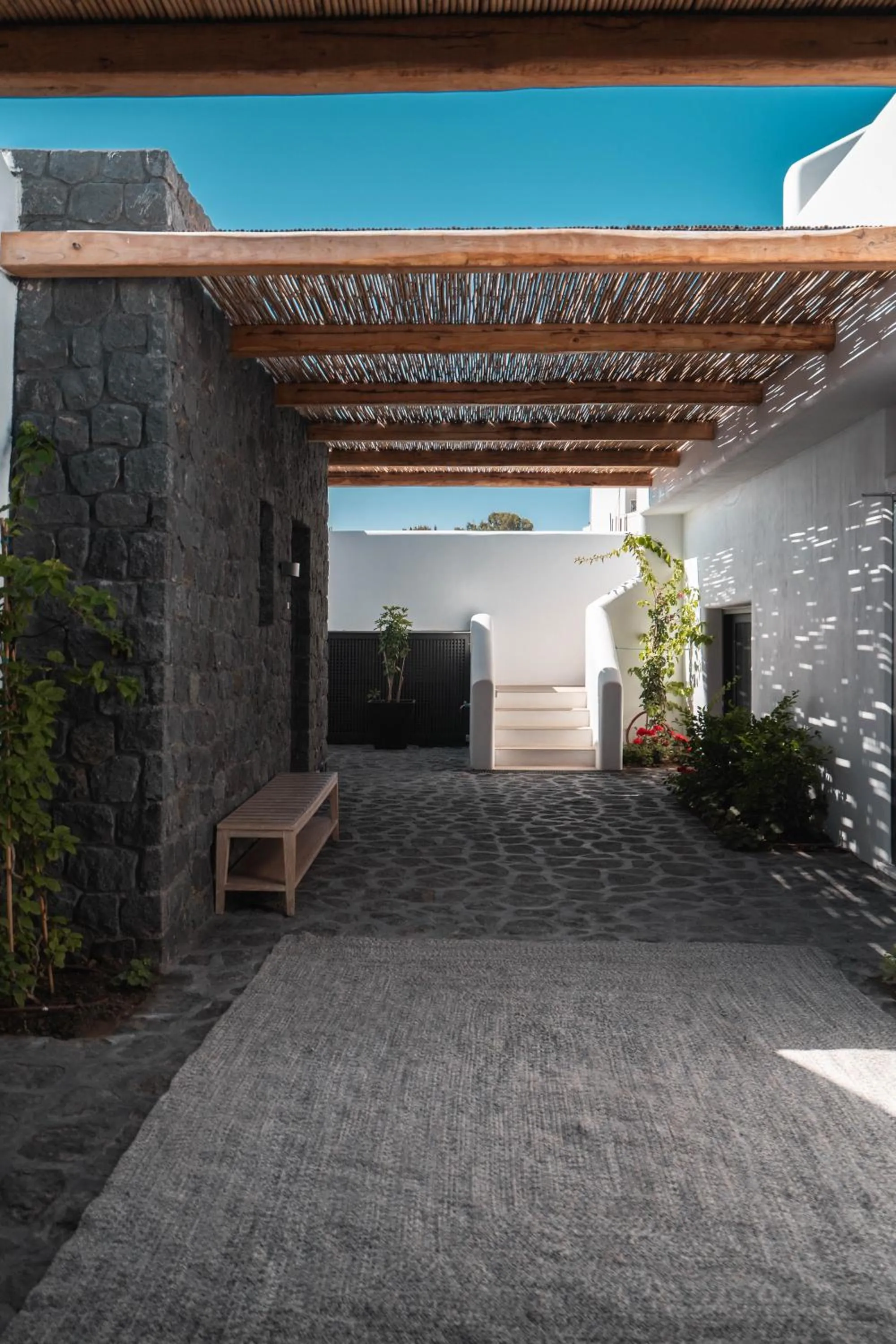 Property building in NĒRO Suites by NOMÉE Hospitality Group