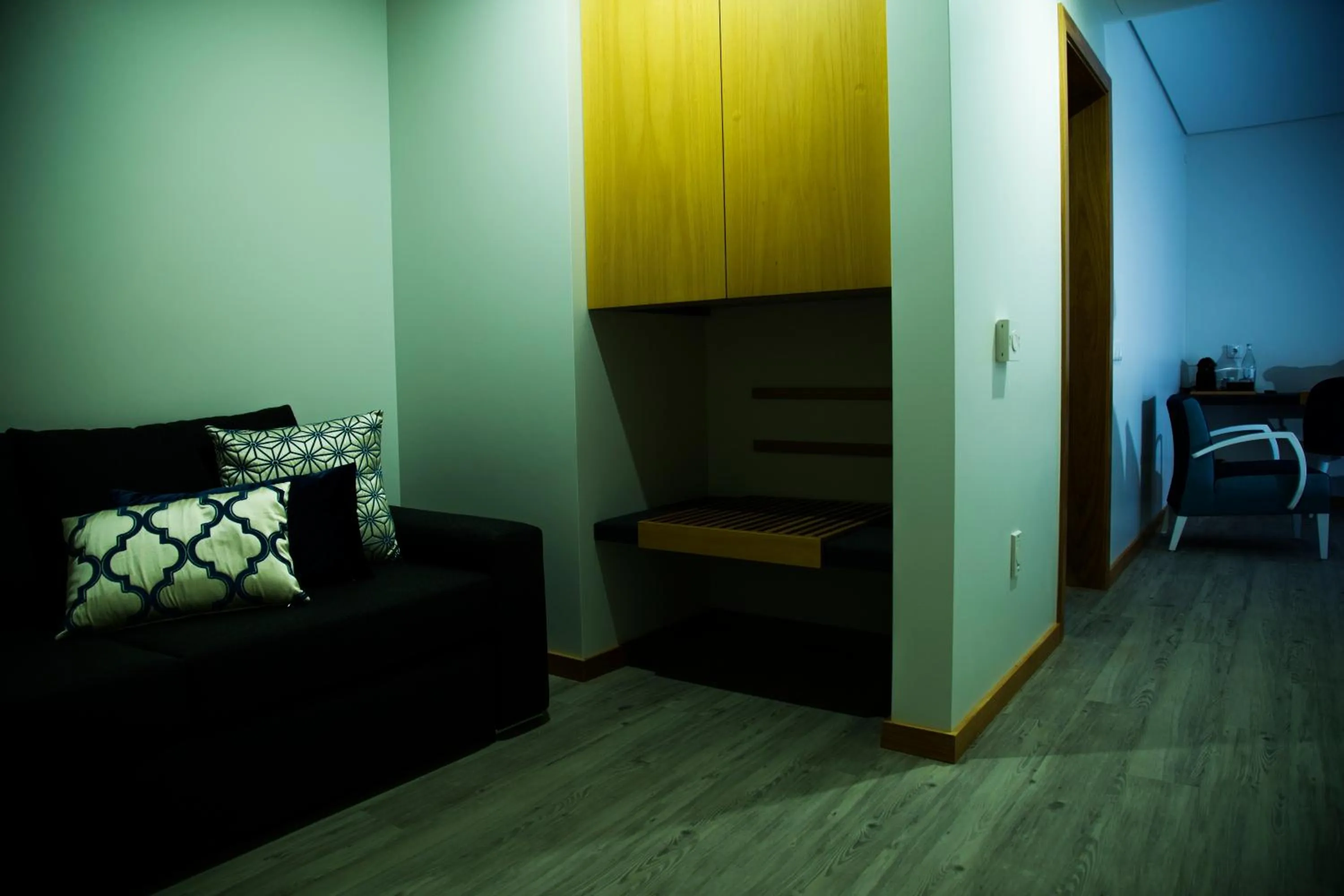 Seating area, Bed in Villa Prime Hotel