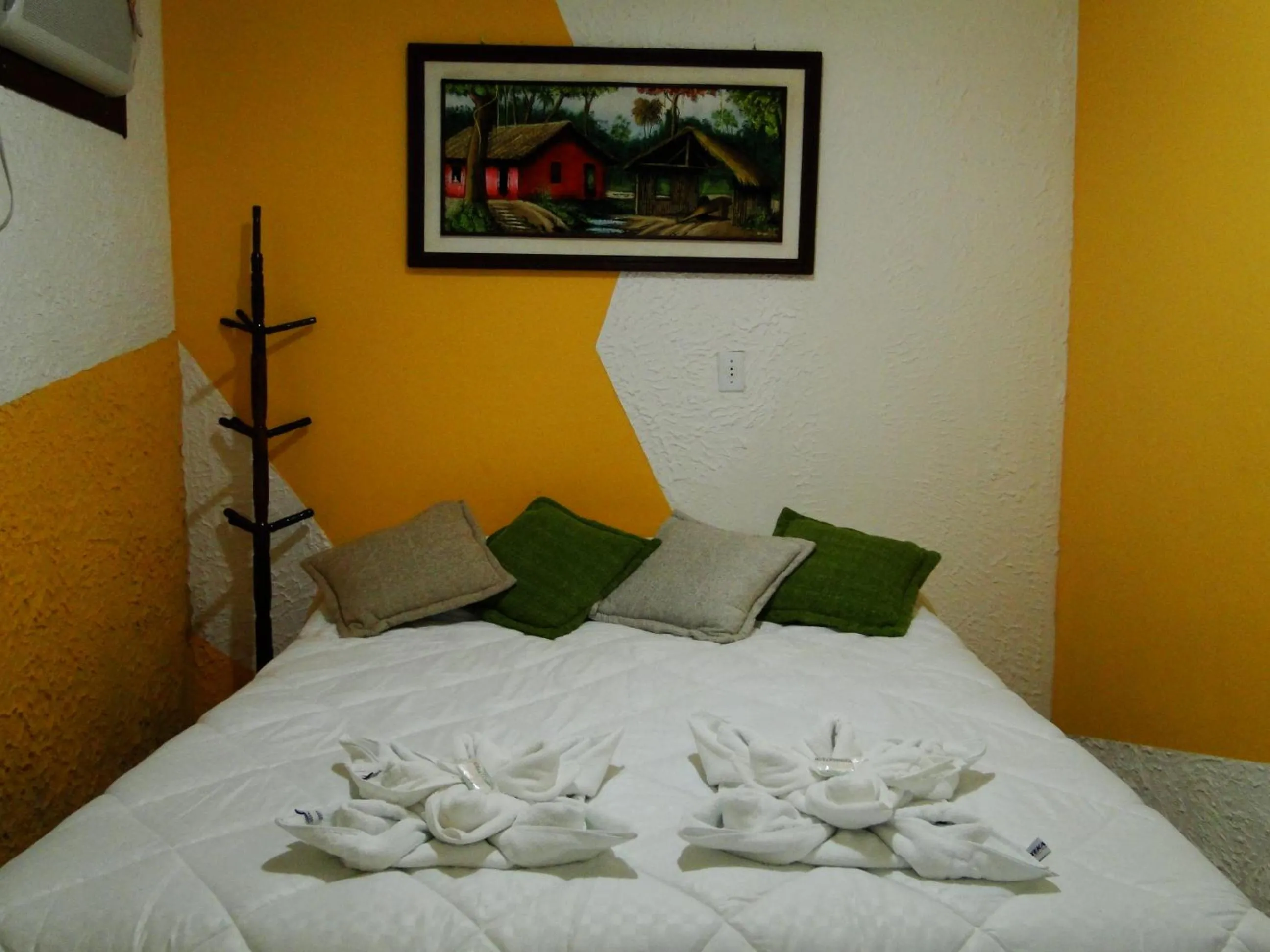 Bed in Pousada das Acerolas