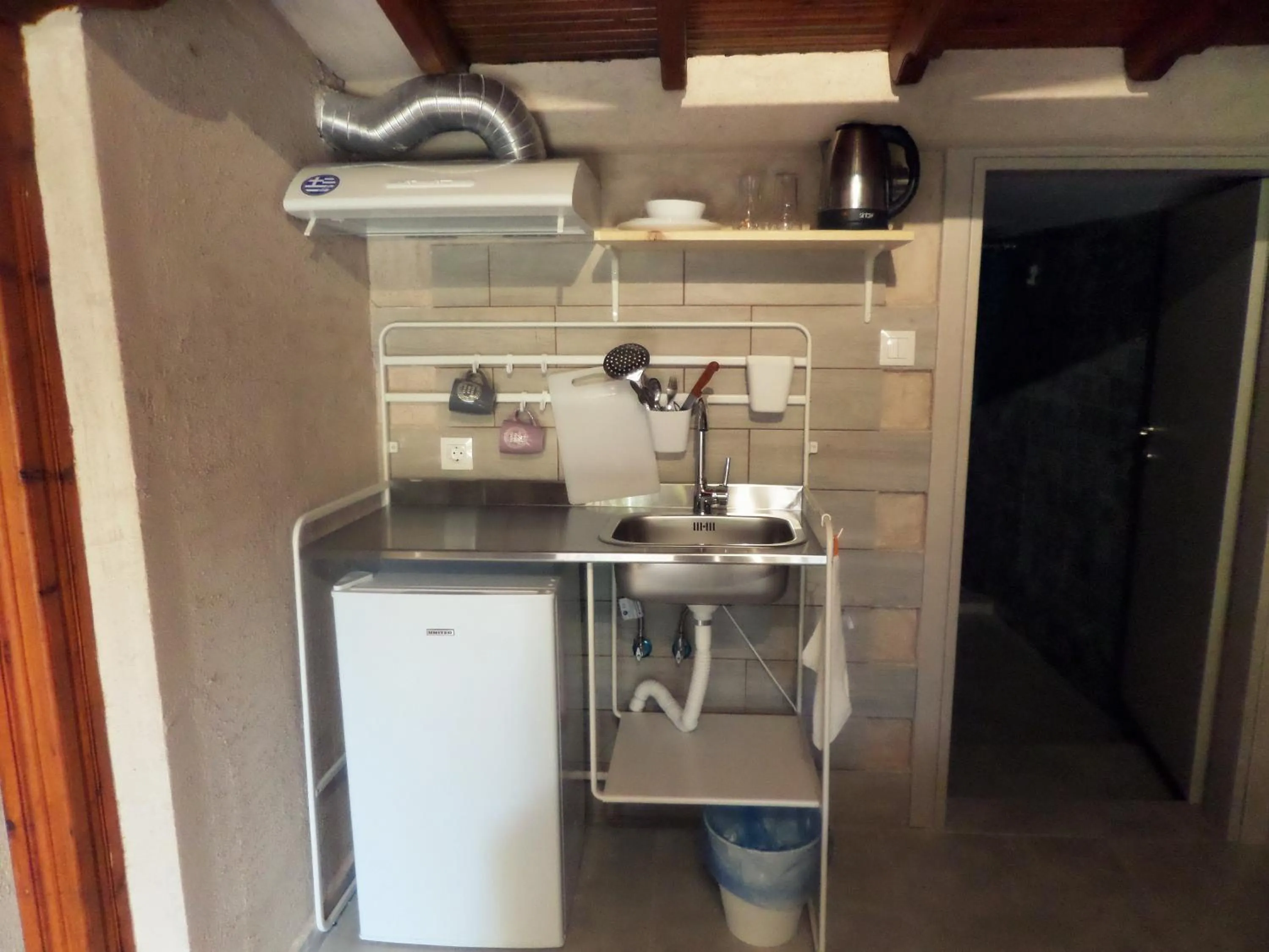 Kitchen or kitchenette in Artemis Studios & Apartments