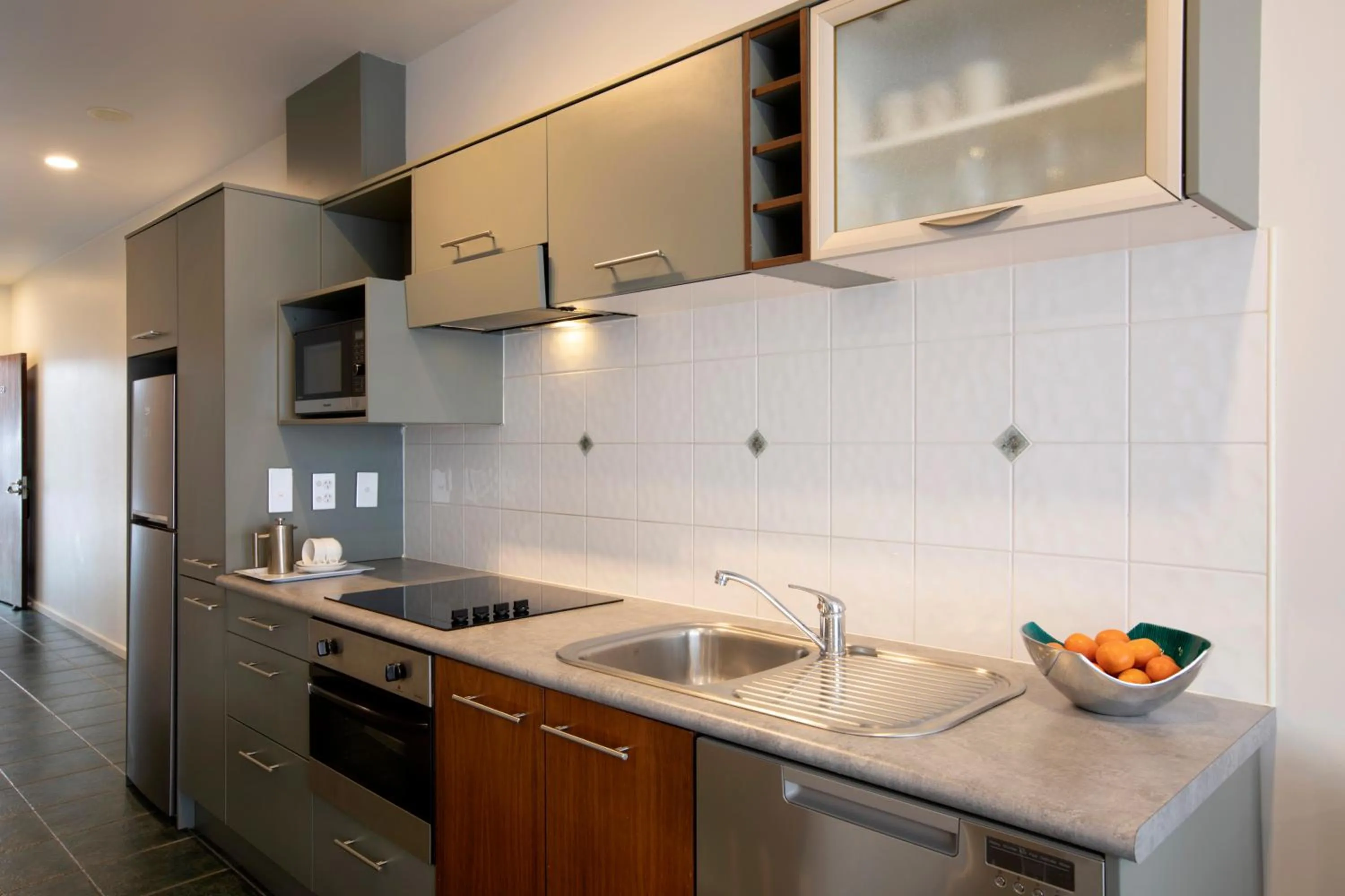Kitchen or kitchenette in Quest Atrium Apartment Hotel