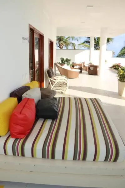 Property building, Bed in Pousada Mar Aberto