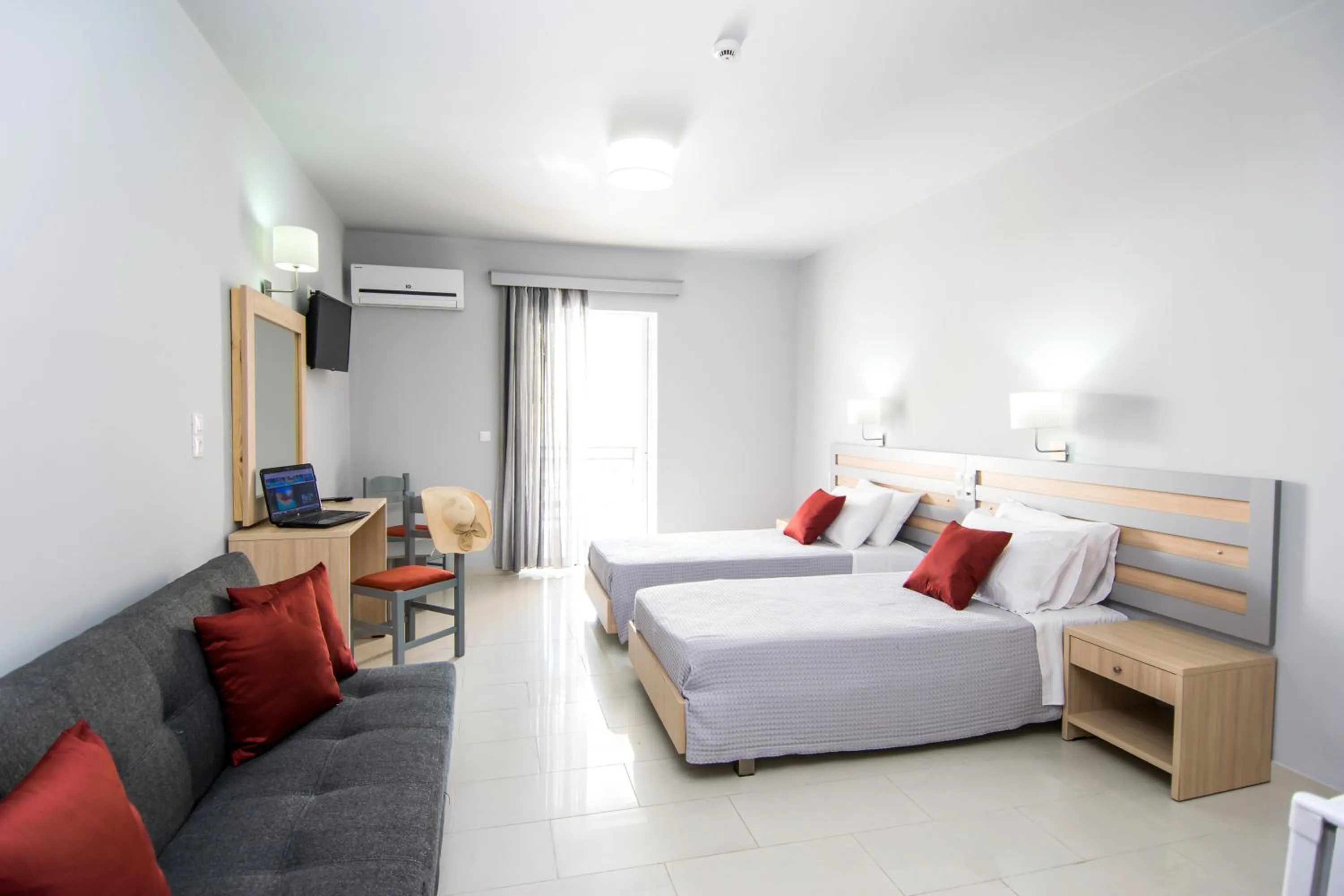 Seating area, Bed in Hera Zakynthos Hotel