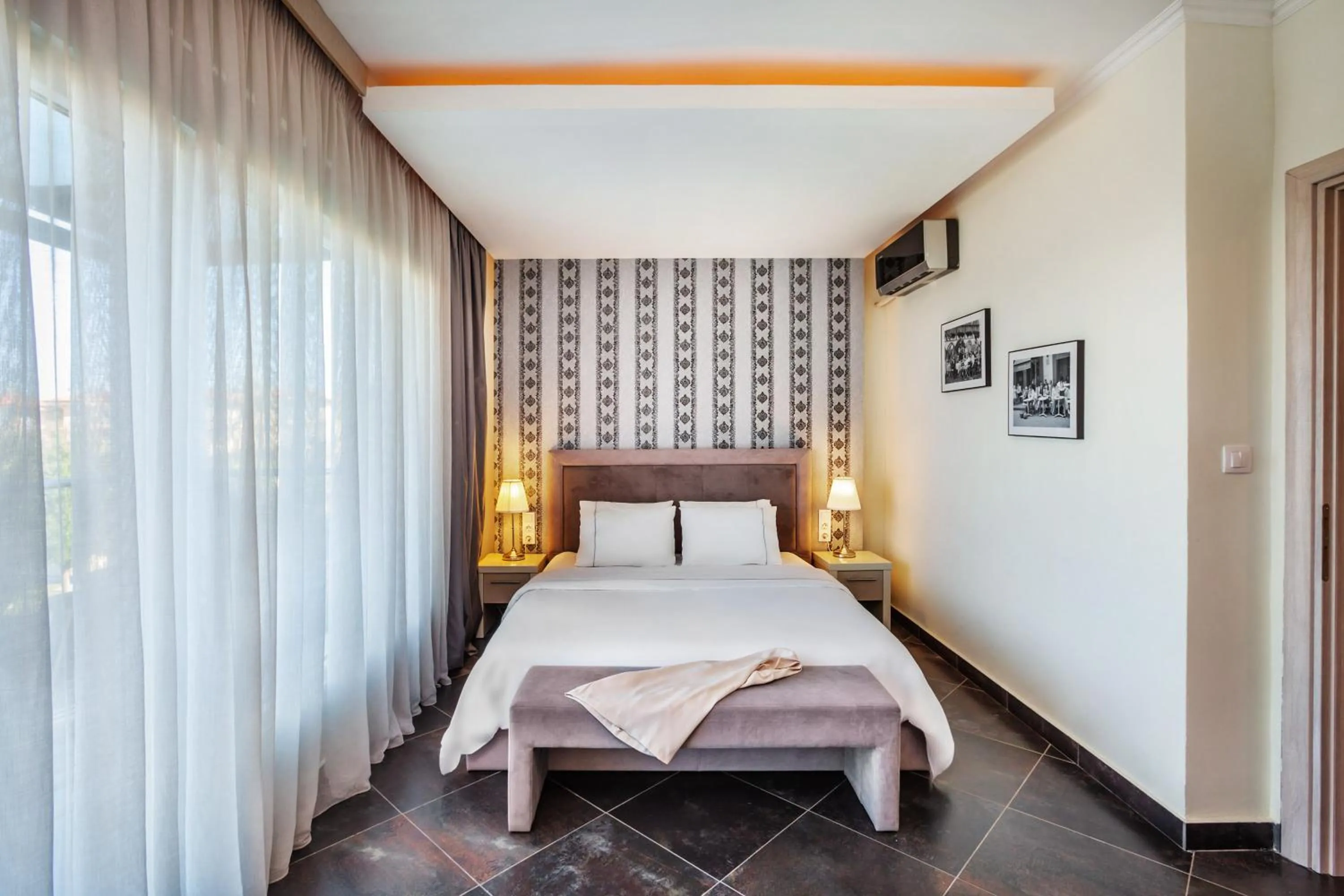 Bed in Sunny Villas Resort & Spa