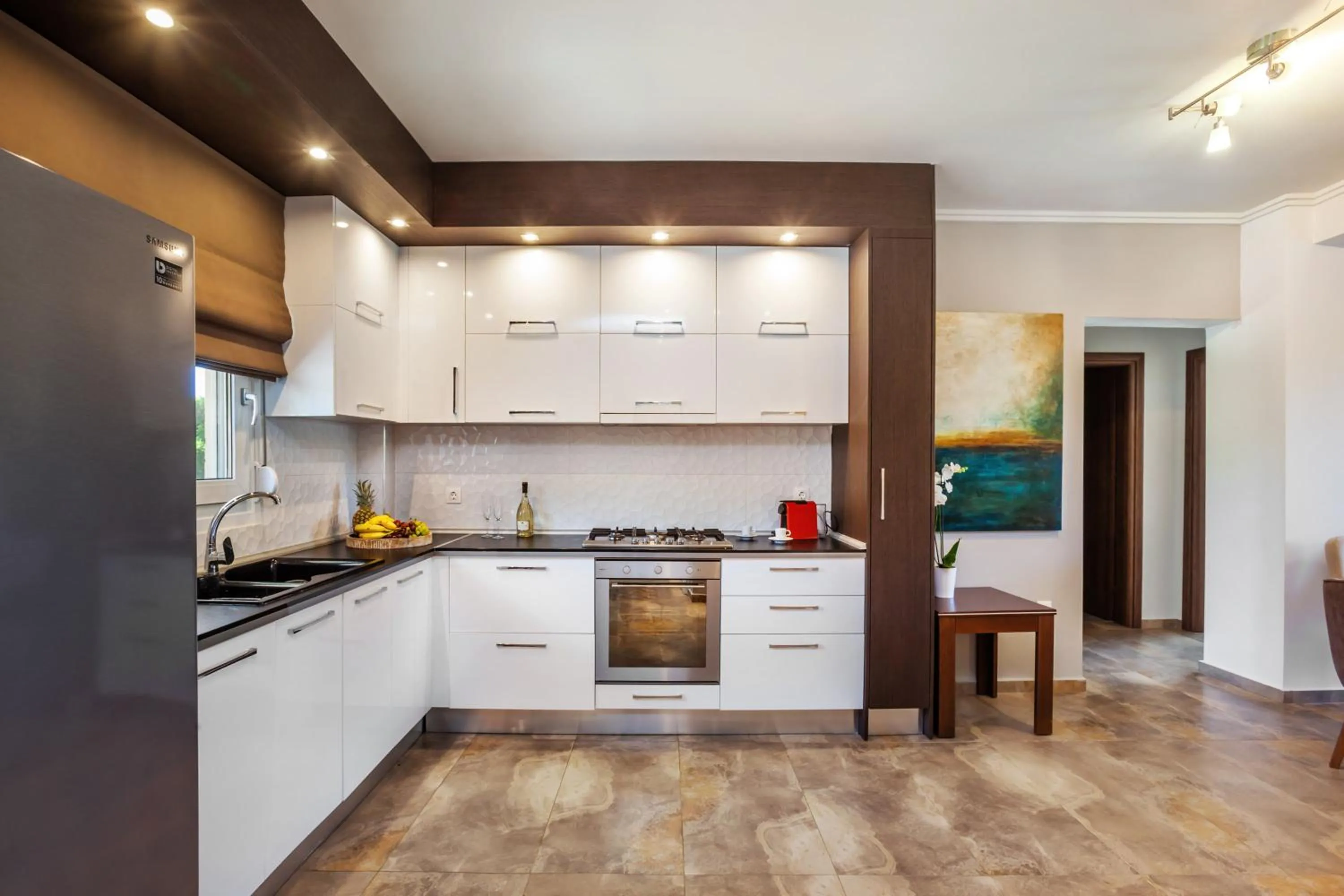 Kitchen or kitchenette in Sunny Villas Resort & Spa