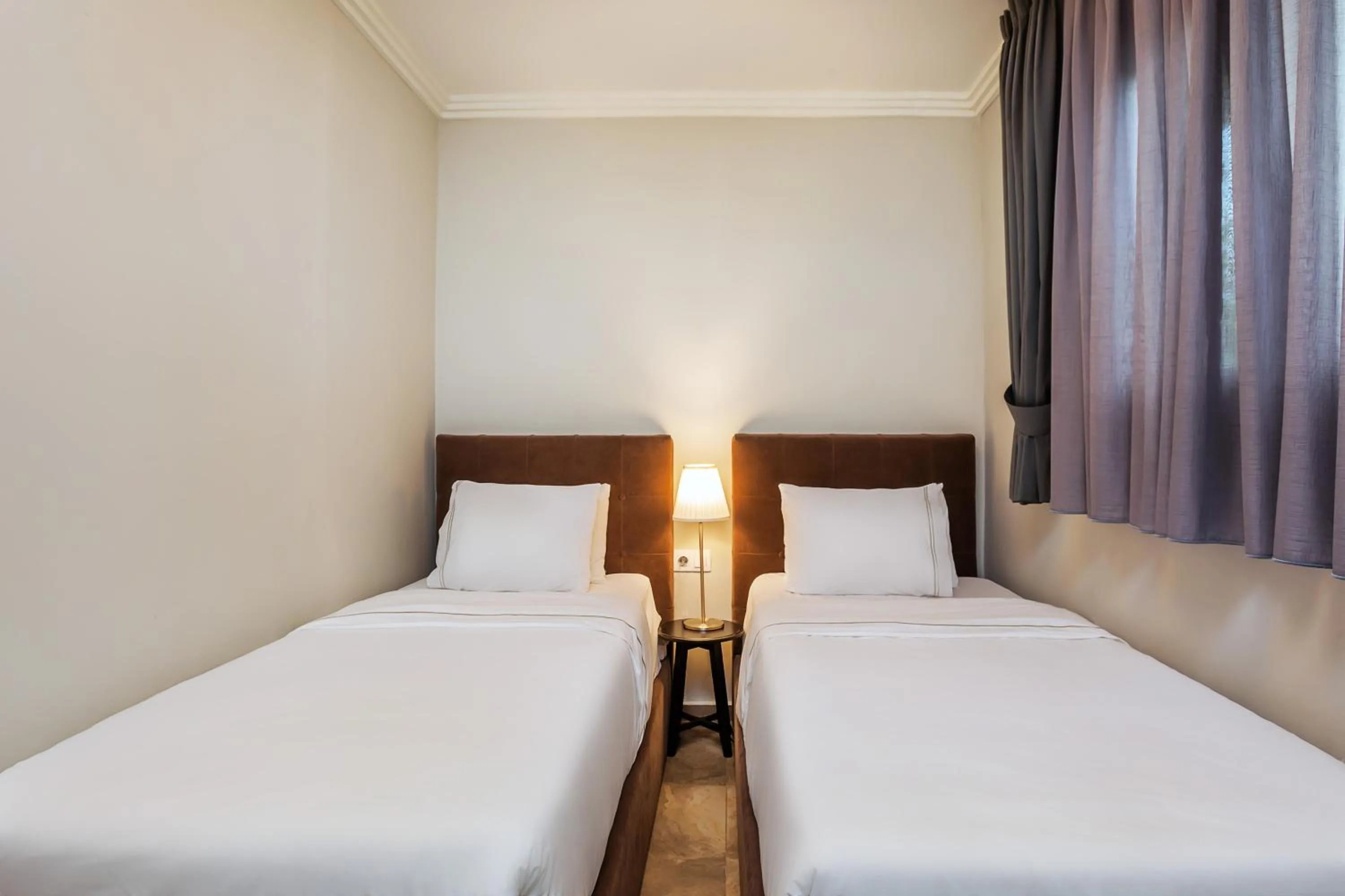 Bedroom in Sunny Villas Resort & Spa