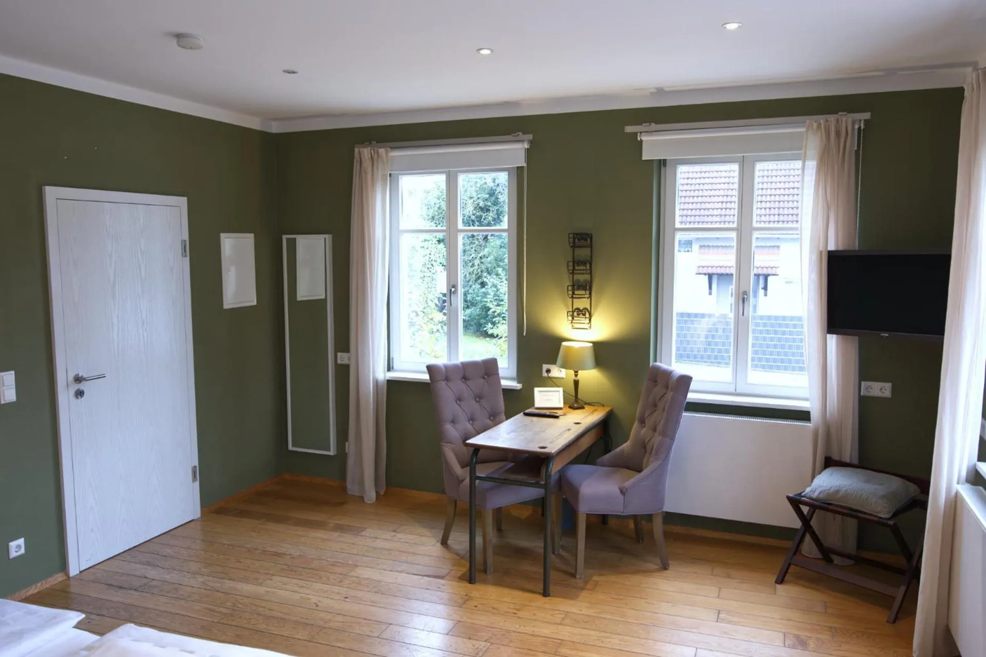 Seating area, Bed in Villa Delange