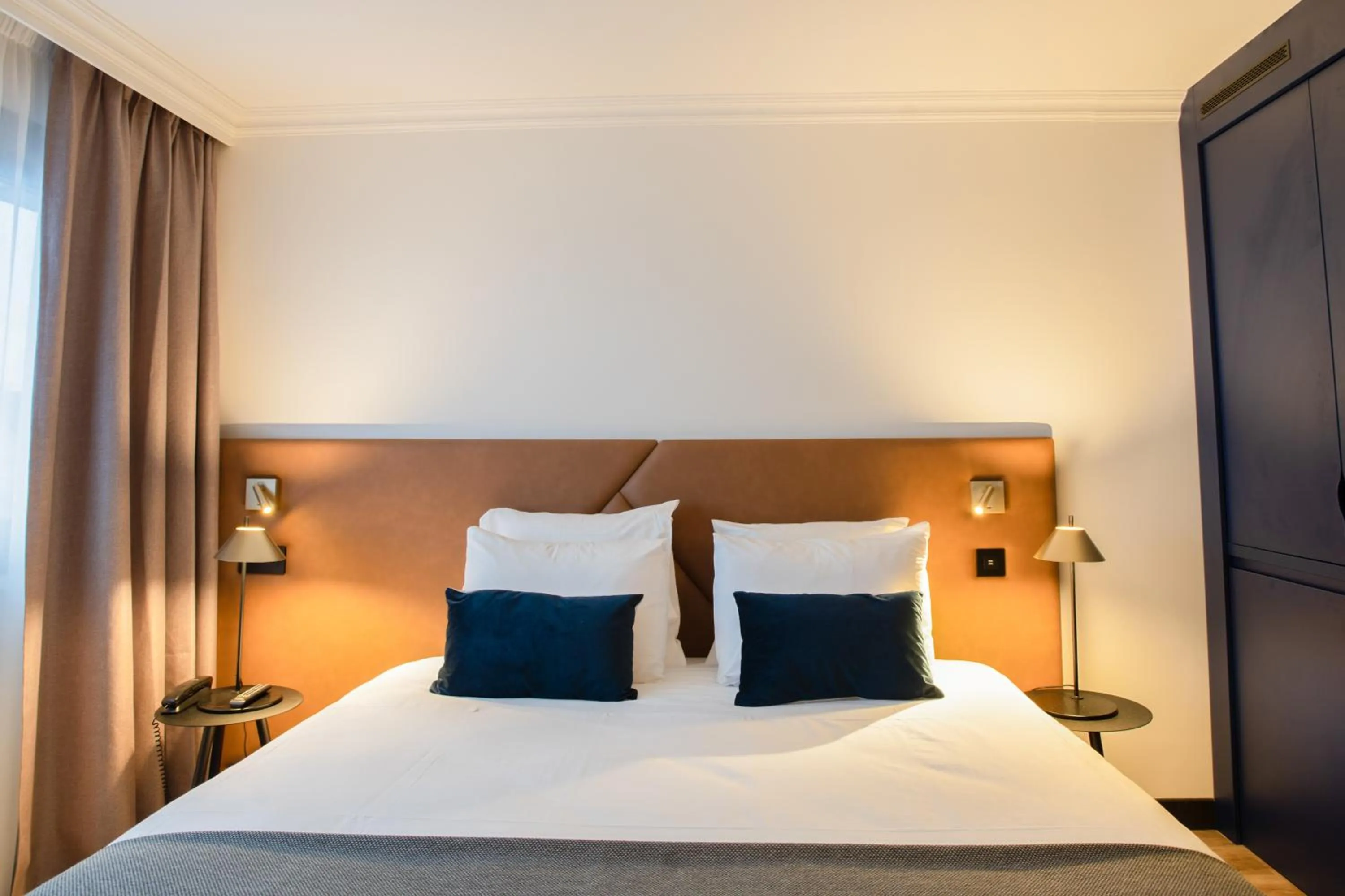 Bed in Appart'City Collection Genève Aéroport - Ferney Voltaire