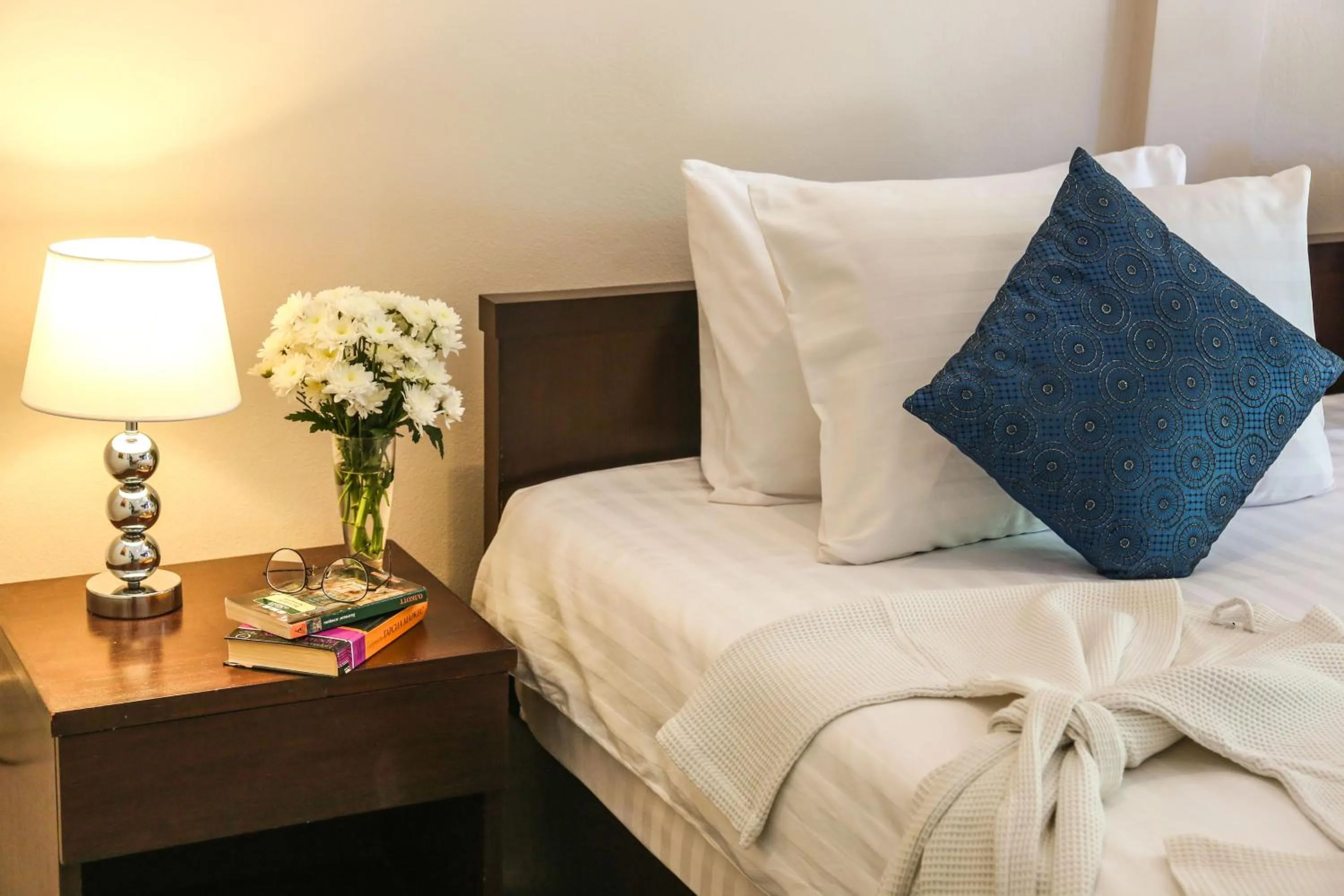 Bed in Naiharn Beach Resort - SHA Plus Extra