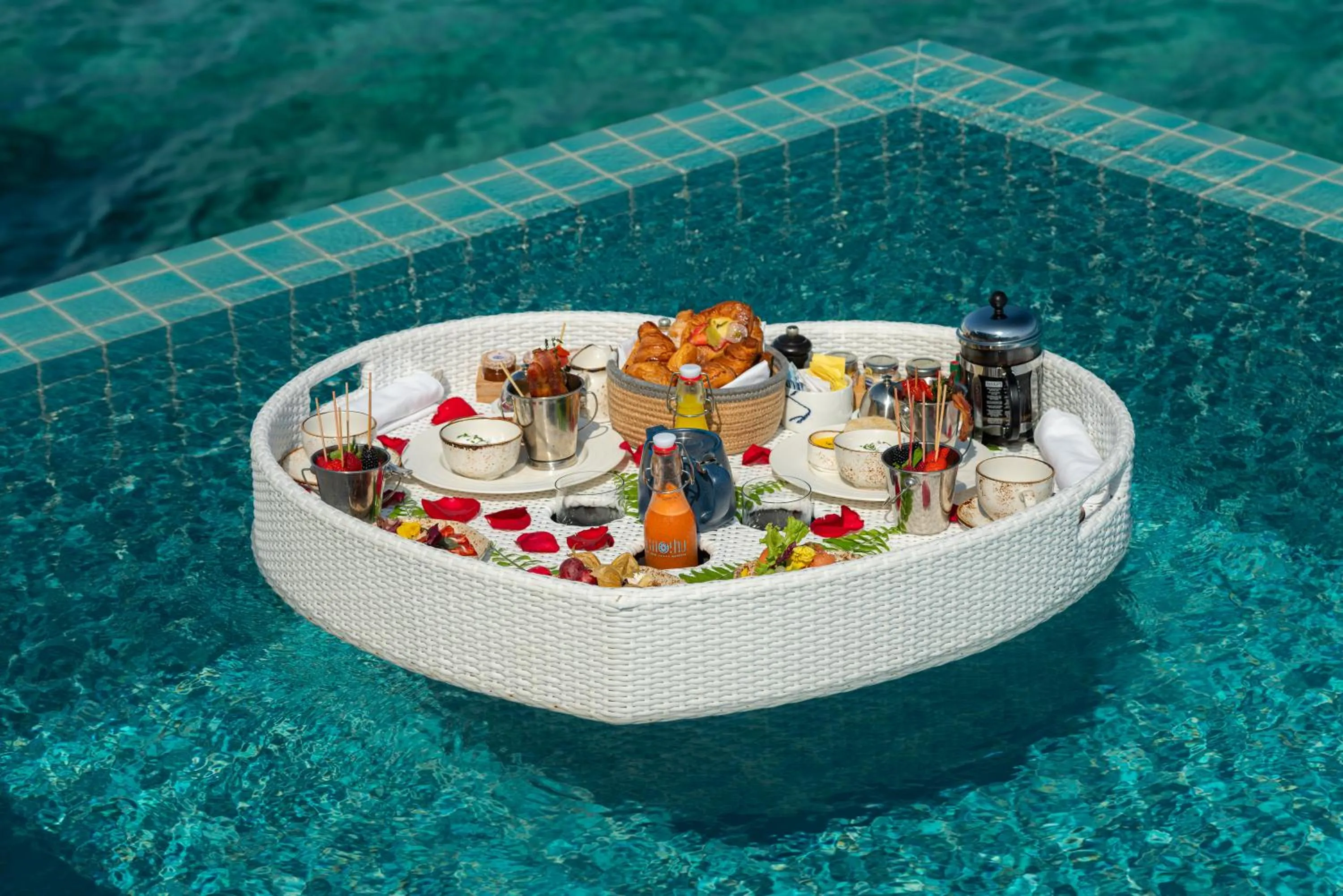 room service in Finolhu, A Seaside Collection Resort, a Member of Design Hotels