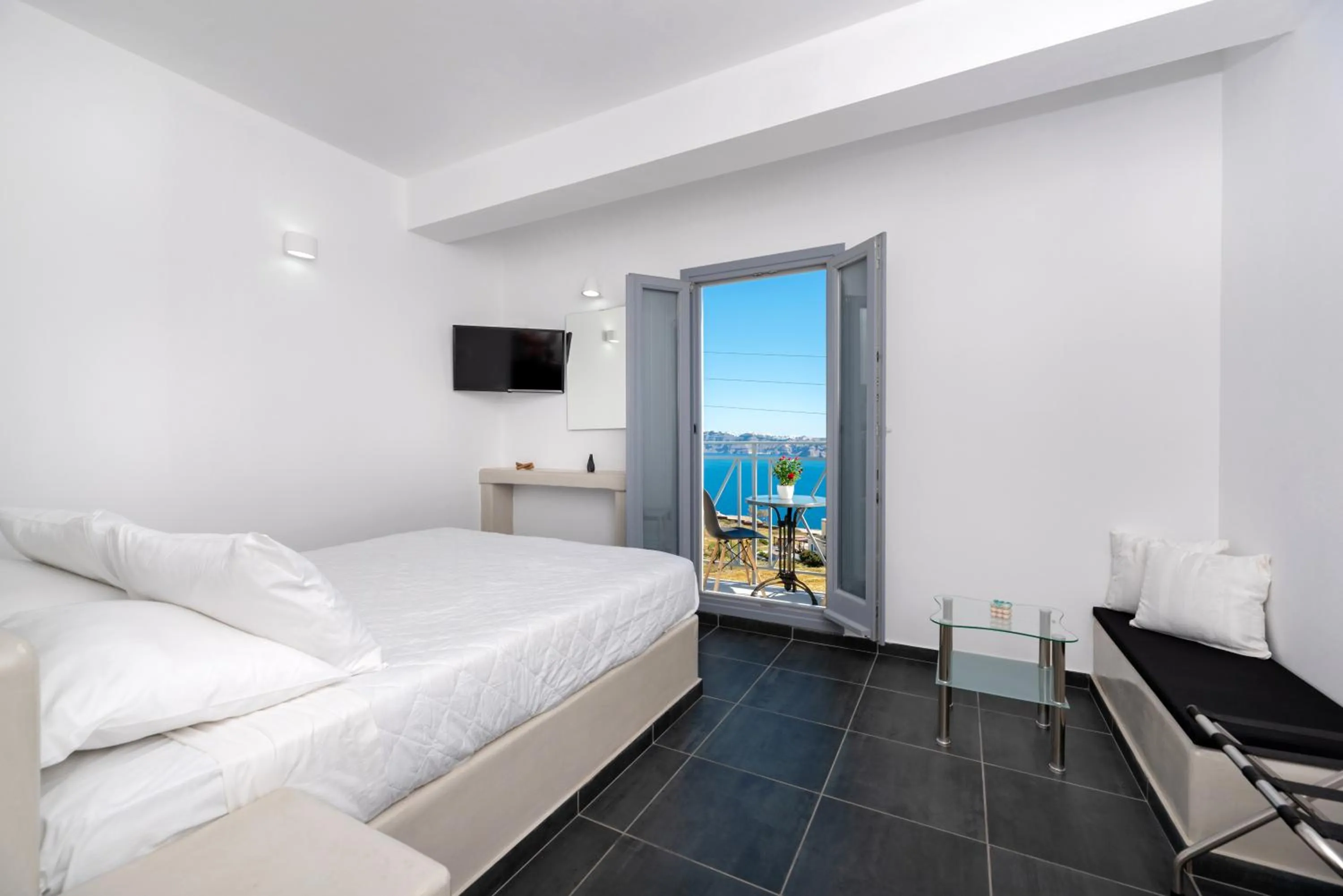 Bed in Pancratium Villas & Suites