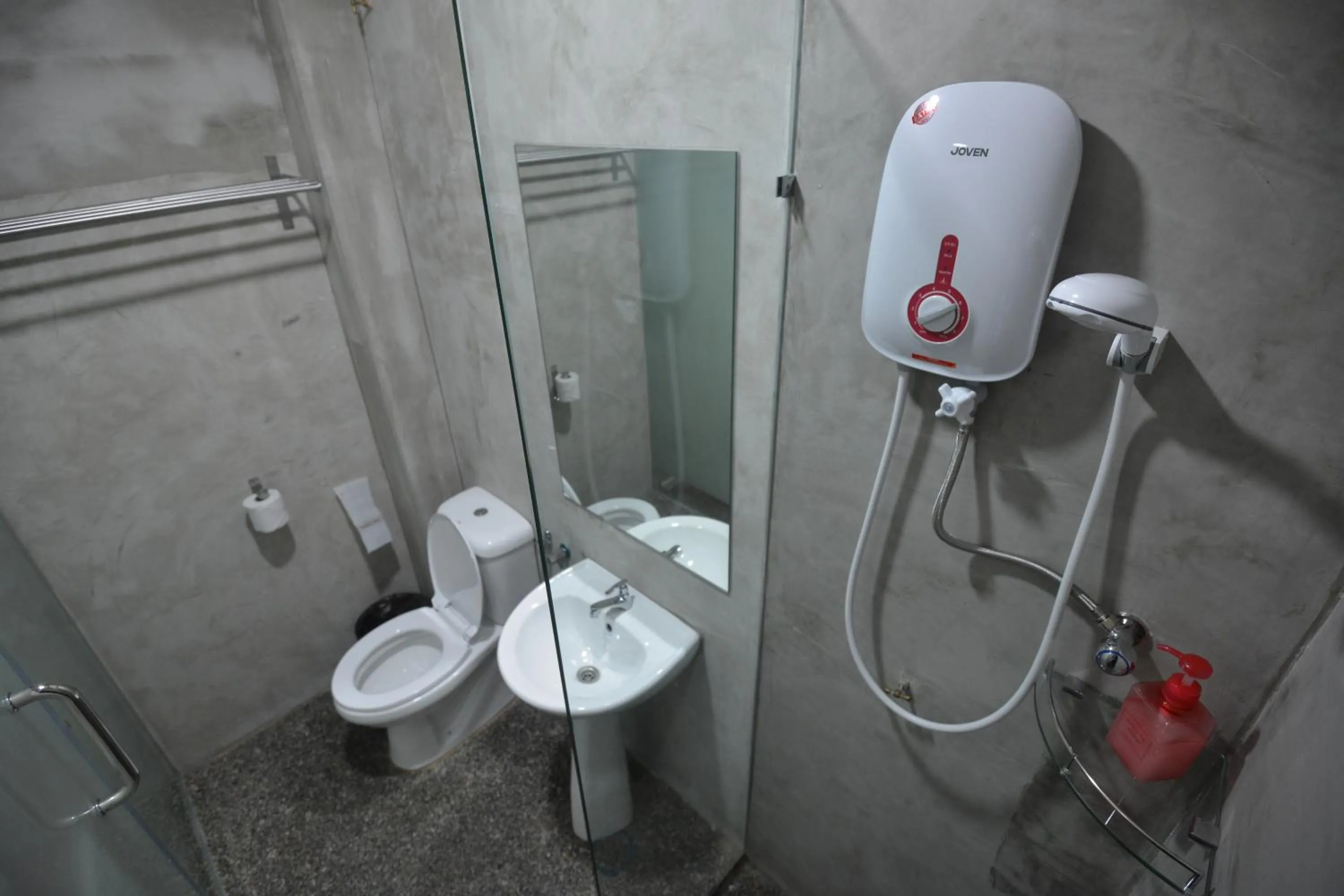 Toilet in Vrest Hotel