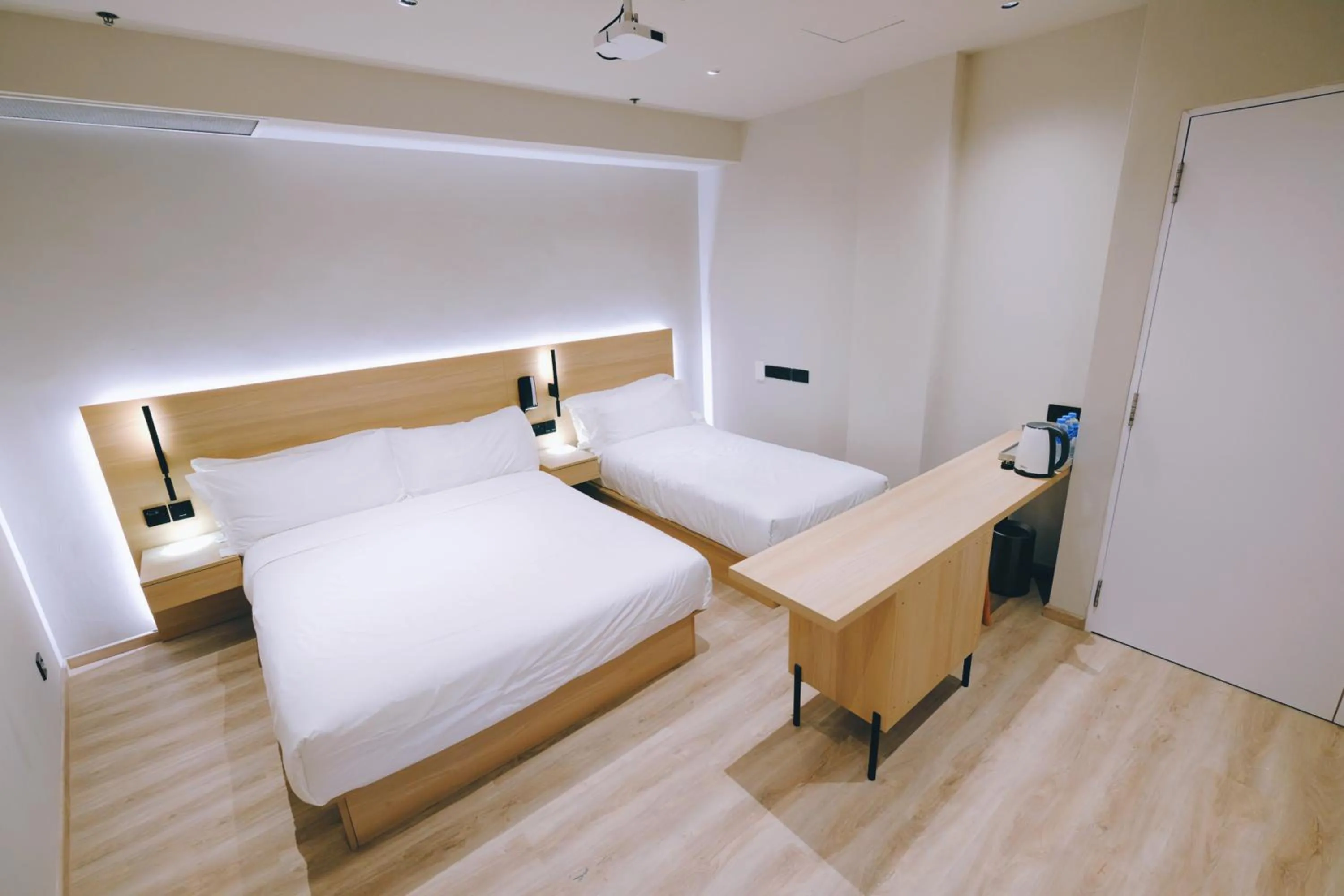 Bed in Rest Bugis Hotel