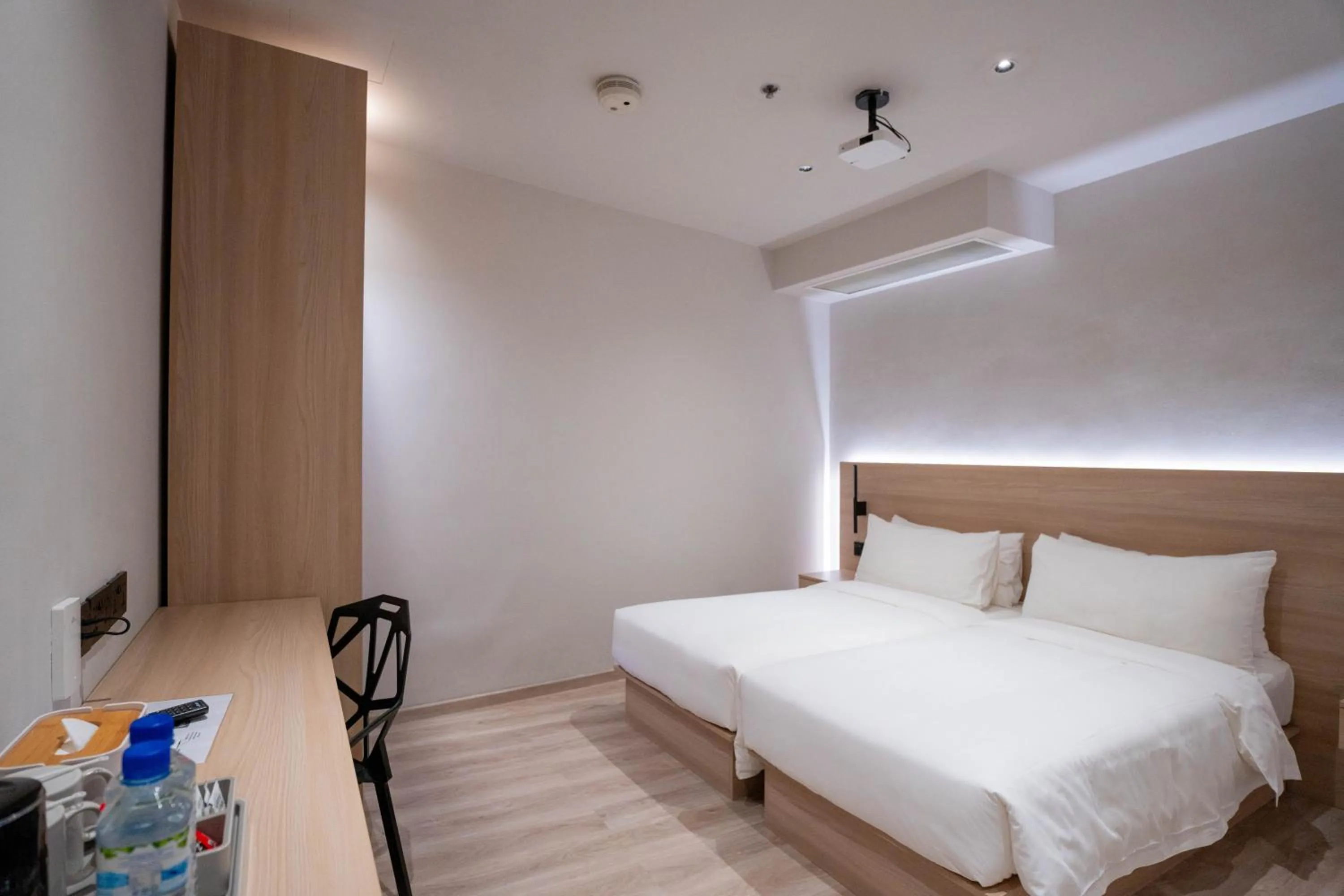 Bed in Rest Bugis Hotel