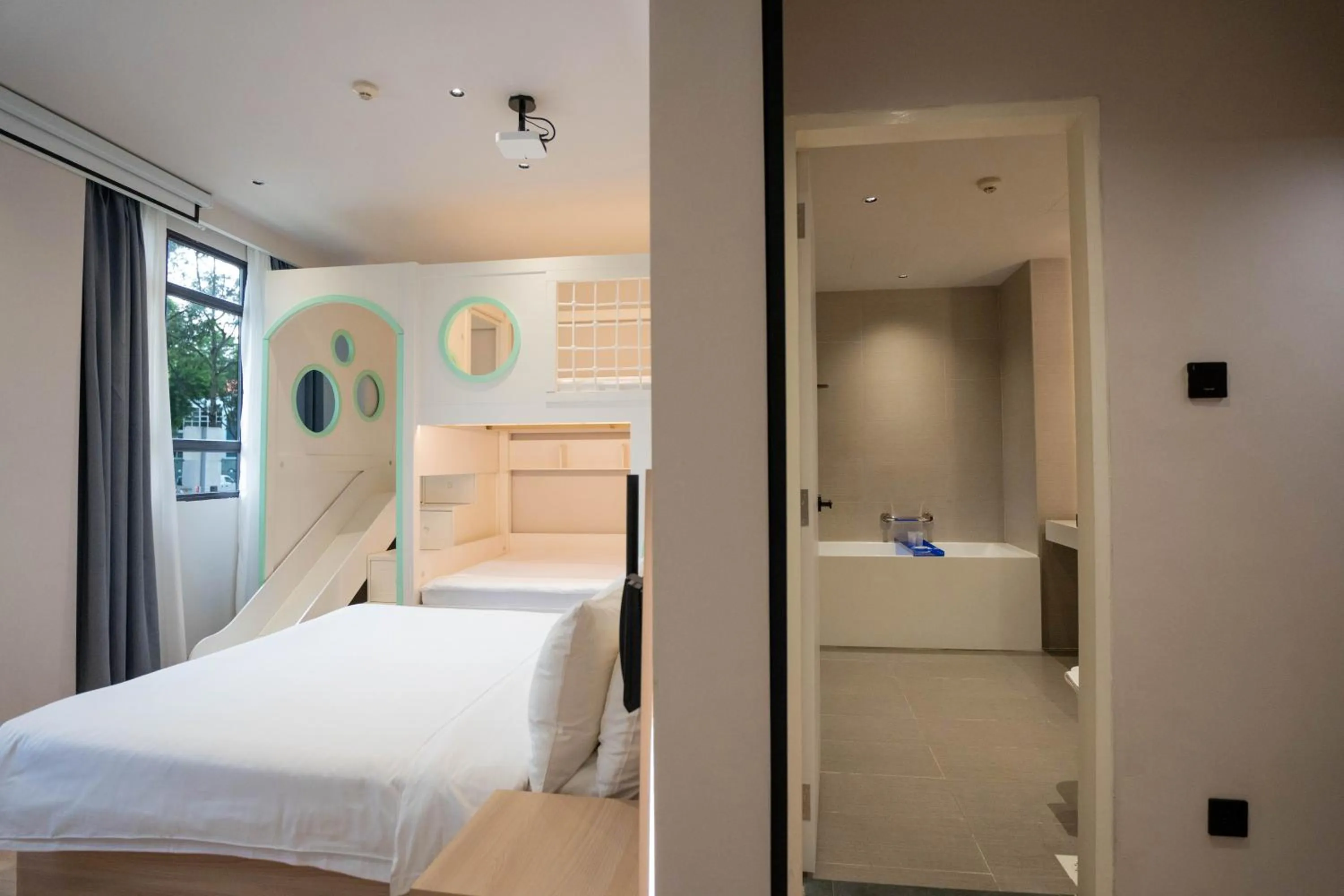 Bed in Rest Bugis Hotel