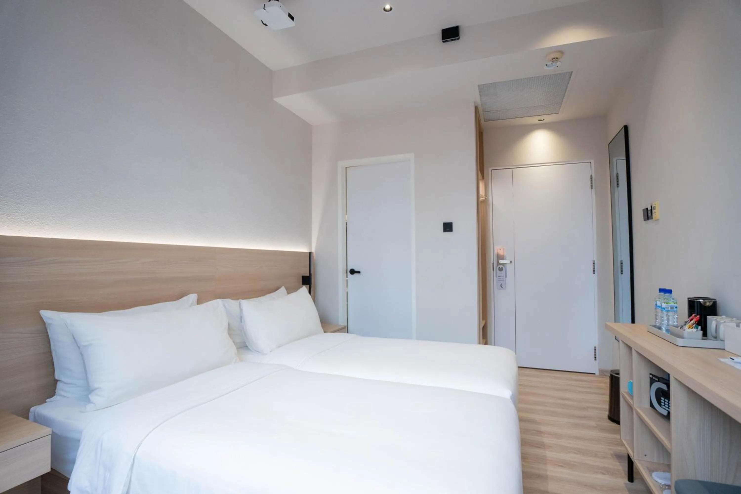 Bed in Rest Bugis Hotel