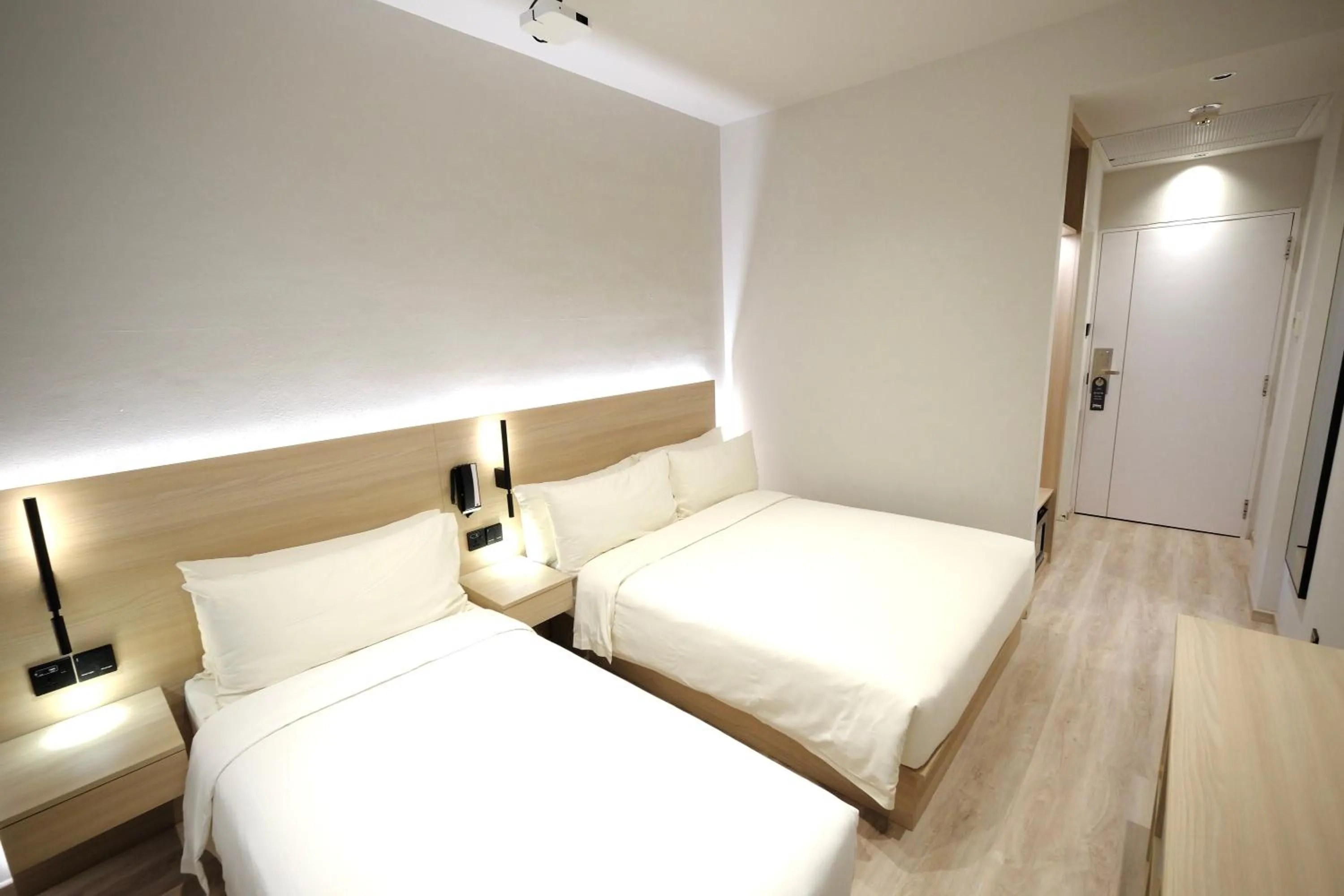 Bed in Rest Bugis Hotel