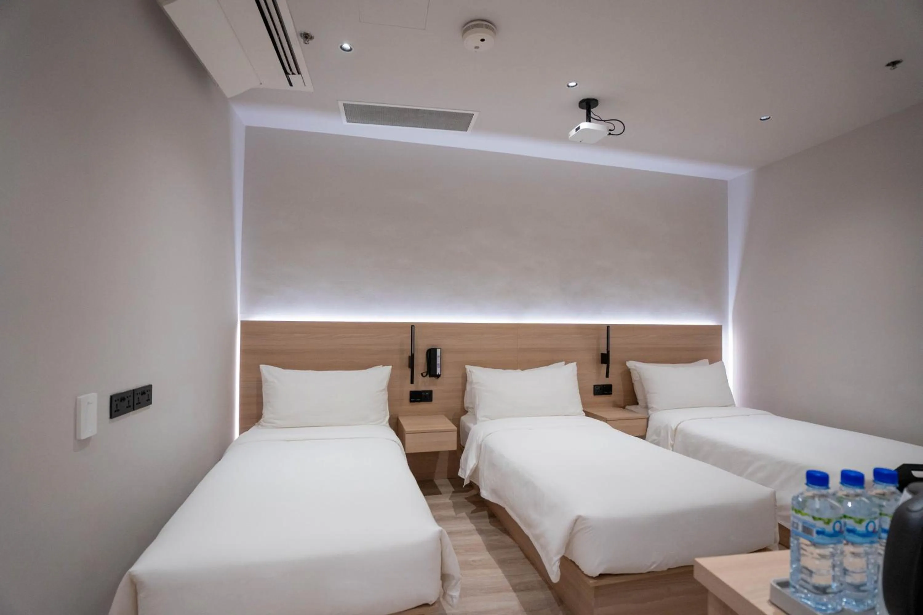 Bed in Rest Bugis Hotel