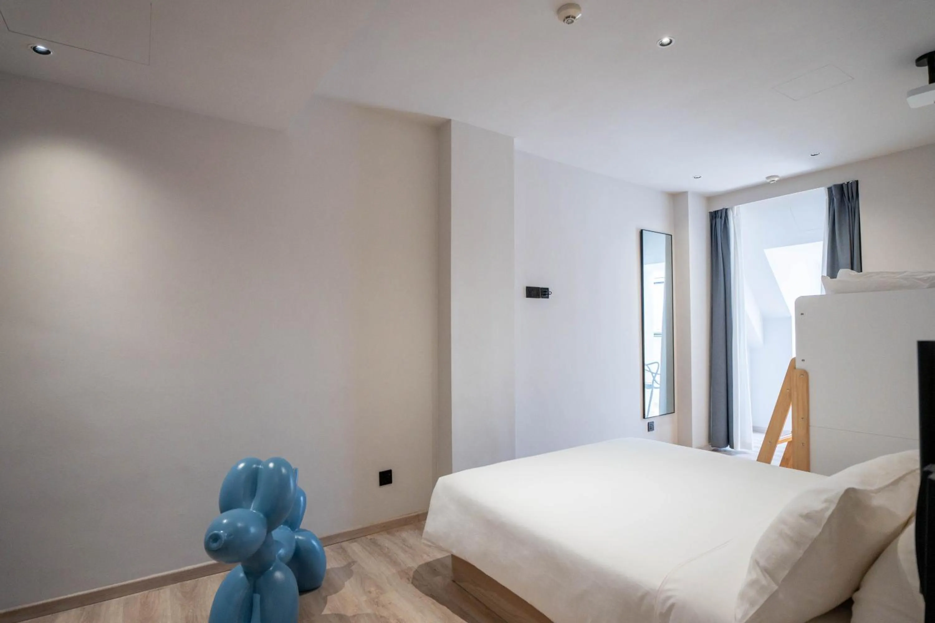 Bed in Rest Bugis Hotel