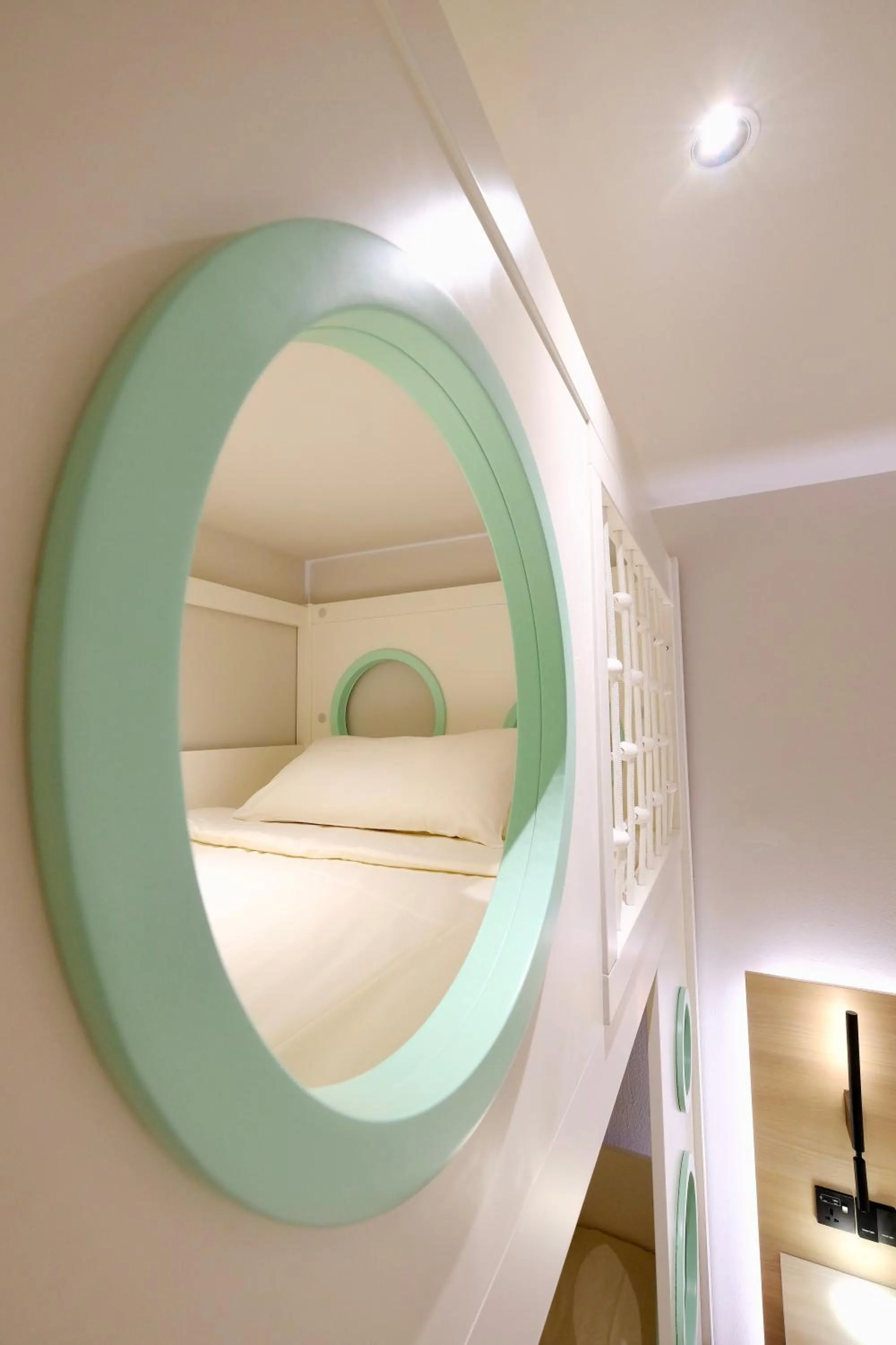 Bed in Rest Bugis Hotel