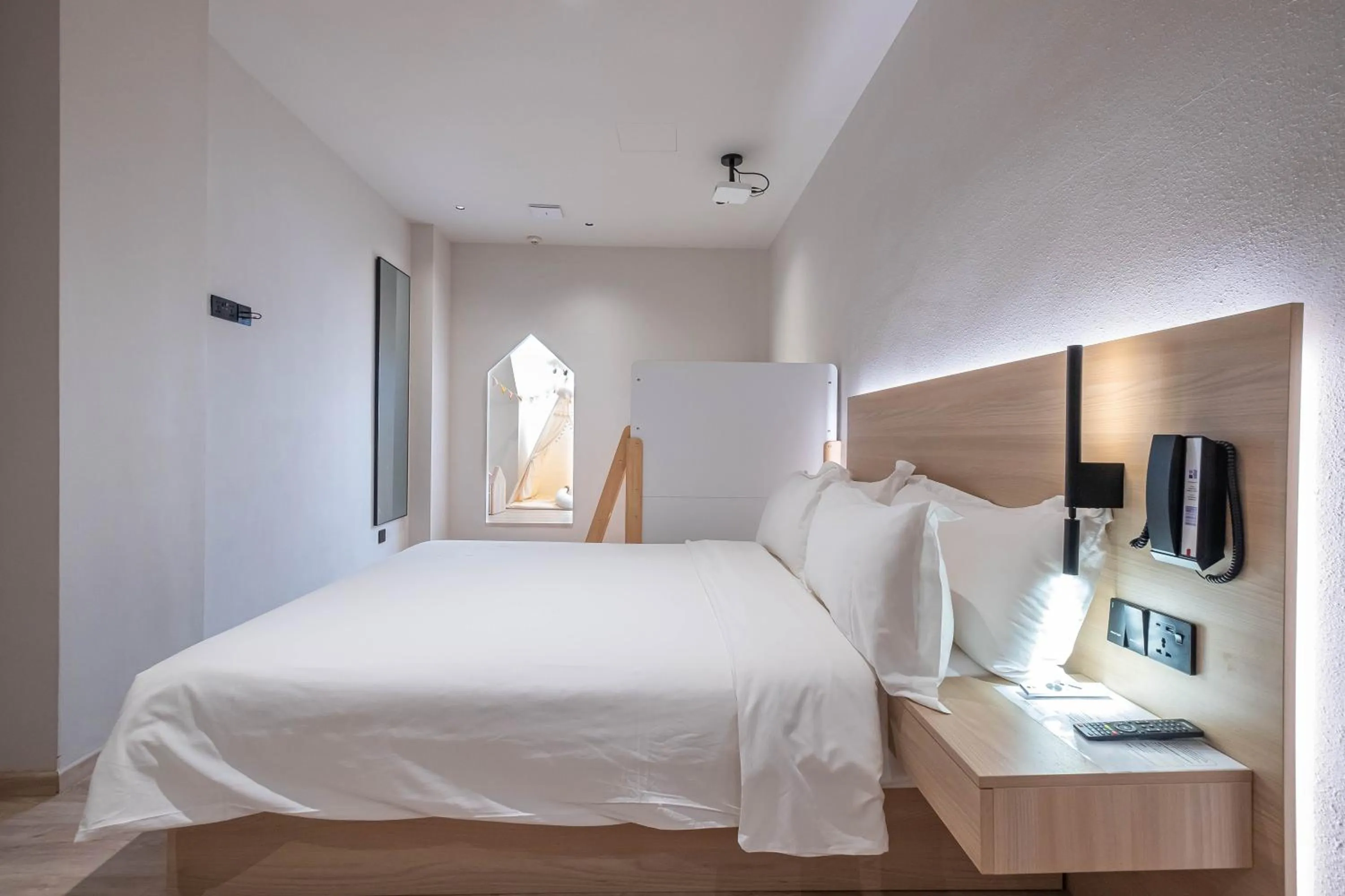 Bed in Rest Bugis Hotel