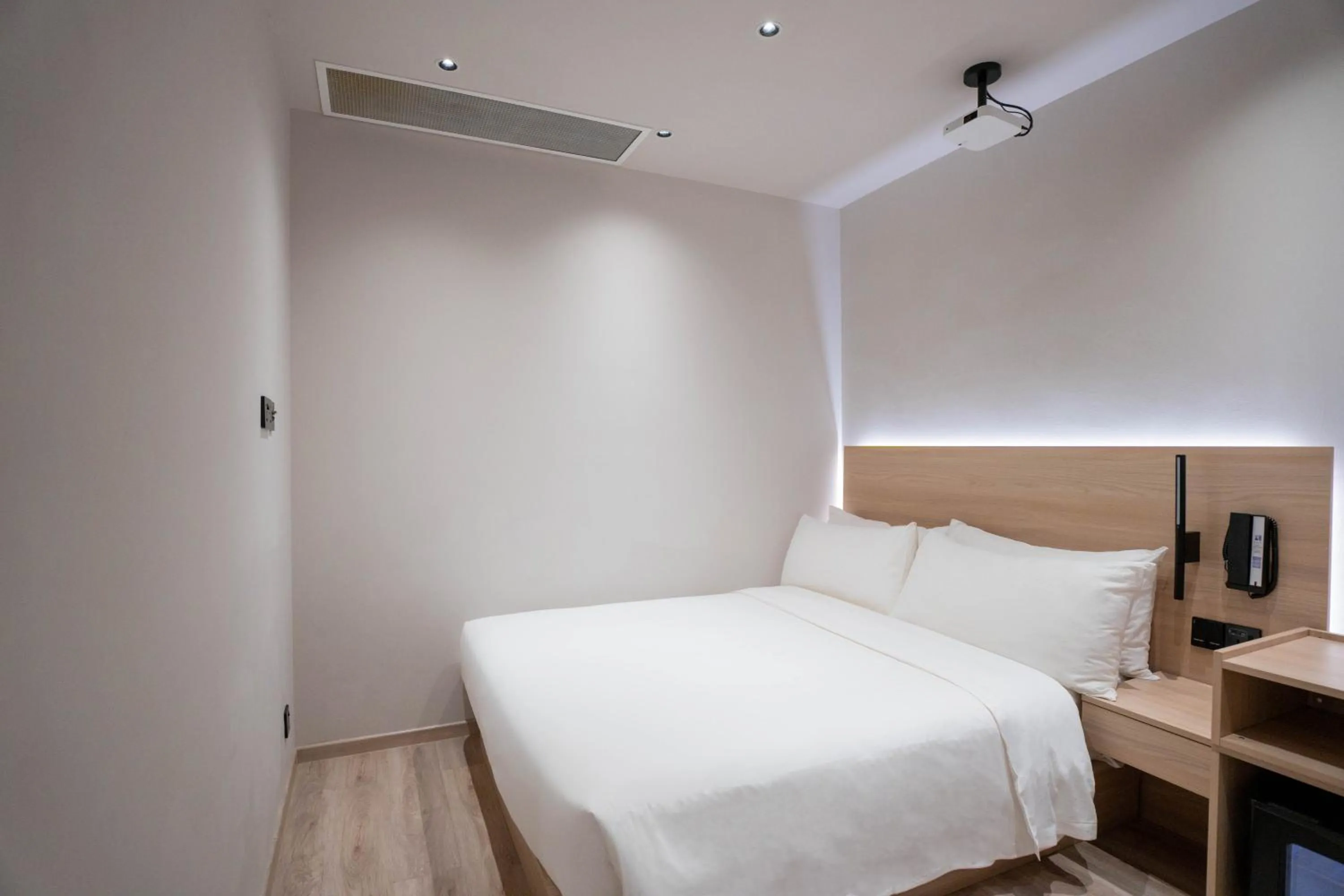 Bed in Rest Bugis Hotel