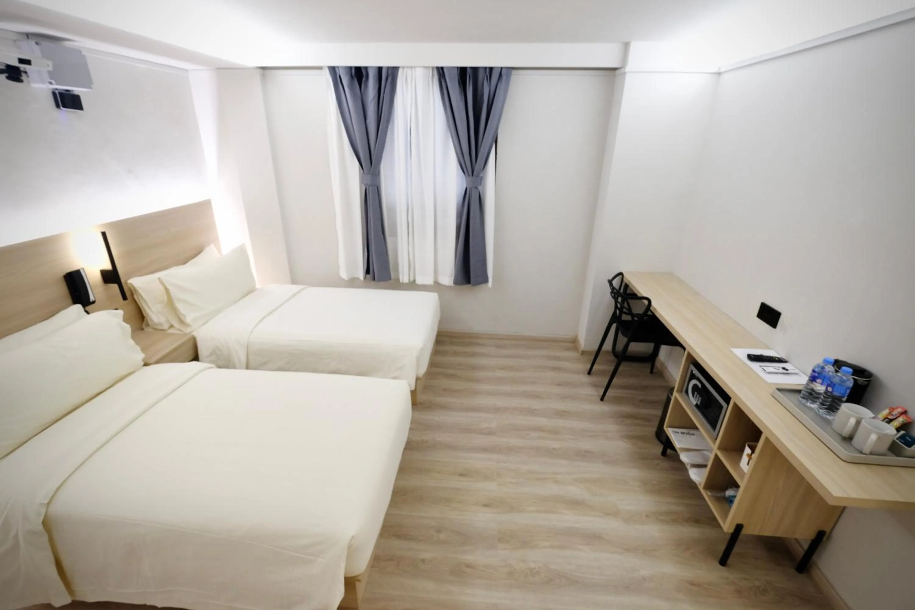 Bed in Rest Bugis Hotel