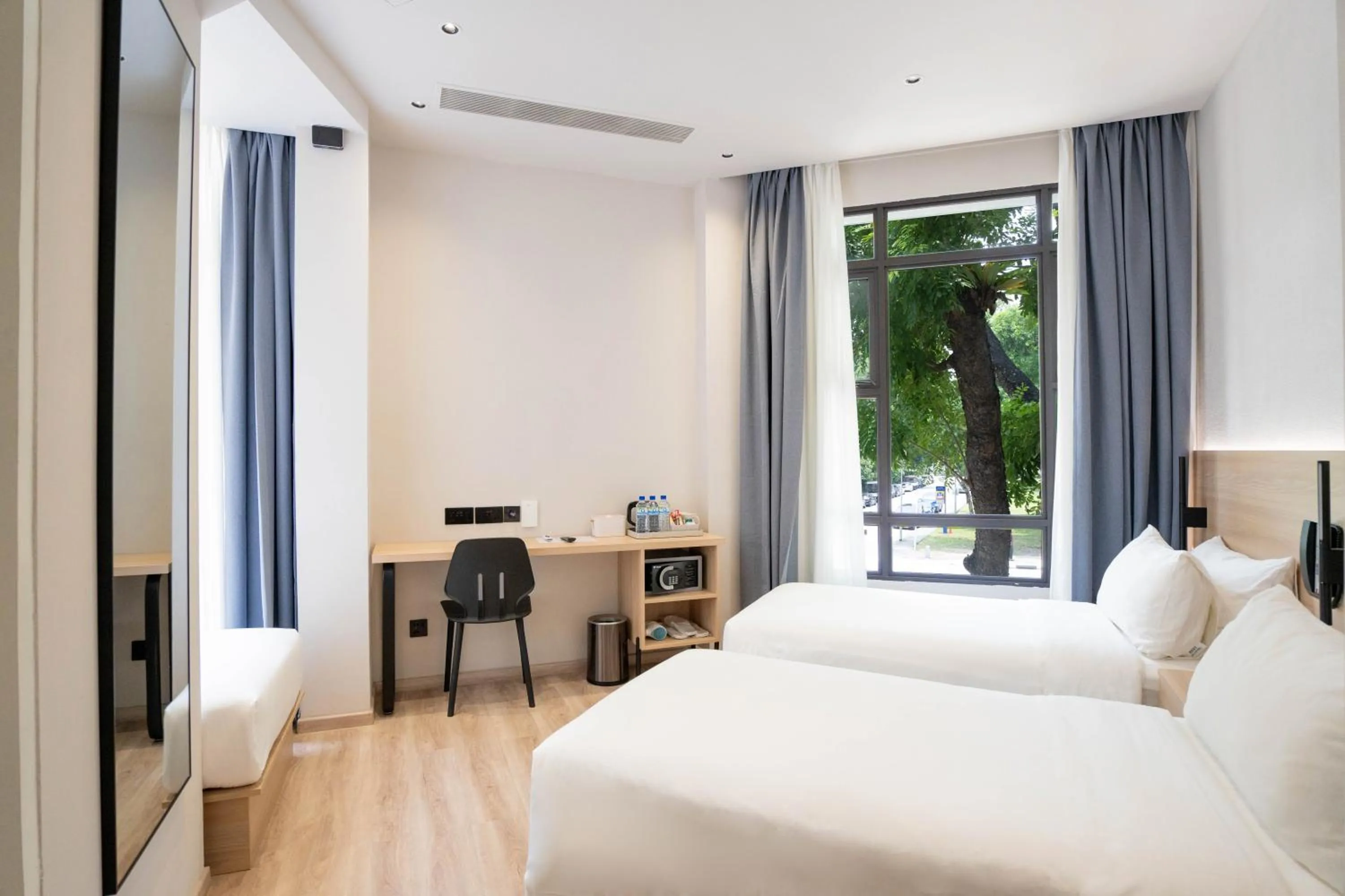 Bed in Rest Bugis Hotel